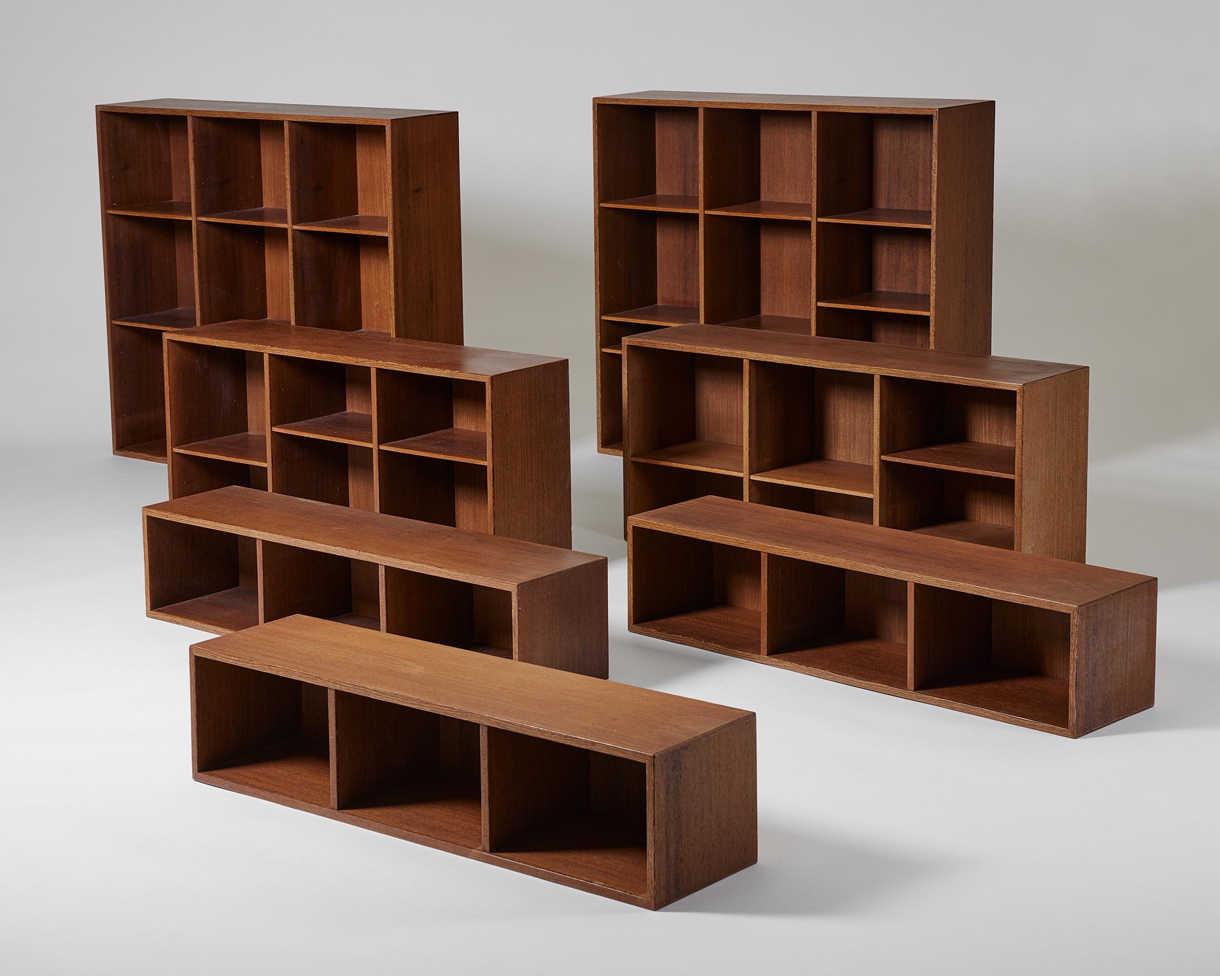 Set of seven bookshelves model 24 designed by Erik Wörts for Kjellerup Möbelfabrik,
Denmark, 1960s.

Wenge.

Dimensions of the two larger shelves:
H: 96 cm / 3' 1 3/4''
W: 112 cm / 3' 8''
D: 24 cm / 9 1/2''

Dimensions of the two medium shelves:
H:
