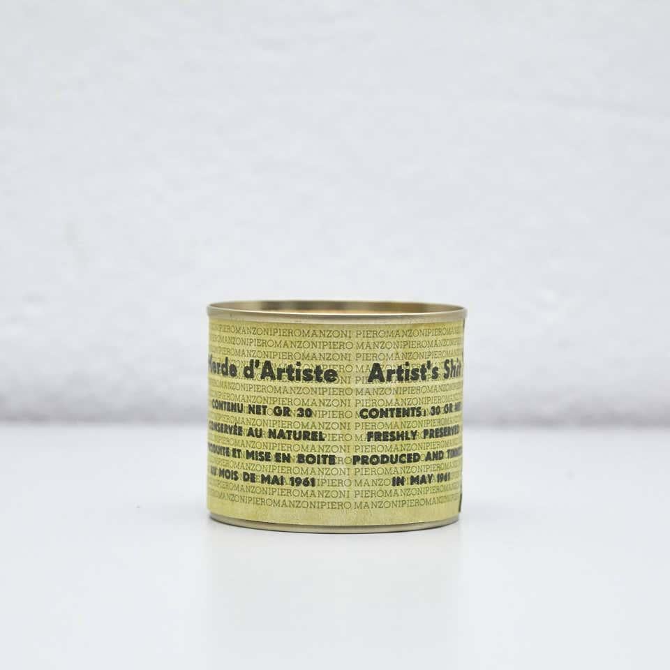 This set consists of 7 re-edition cans made in 2013 by the Manzoni Foundation.

Artist's Shit (Merda d'artista) is a 1961 artwork by the Italian artist Piero Manzoni. The original work consists of 90 tin cans, each filled with 30 grams (1.1 oz) of