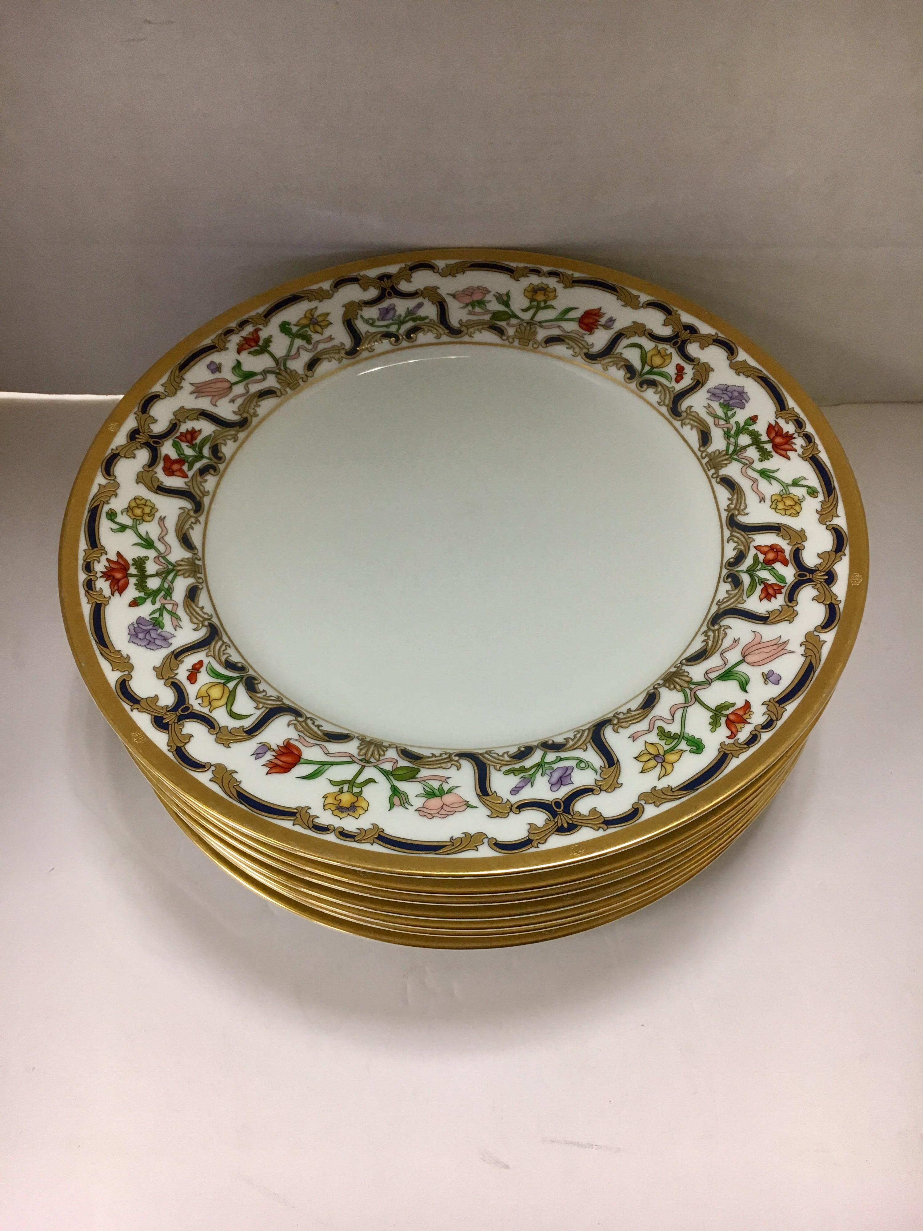 Rare, coveted and out of production Christian Dior fine porcelain china. The pattern is Renaissance and
it features the famed blue and gold scrolls and floral rim. The set was in production from 1990-1999 and then was discontinued, making this