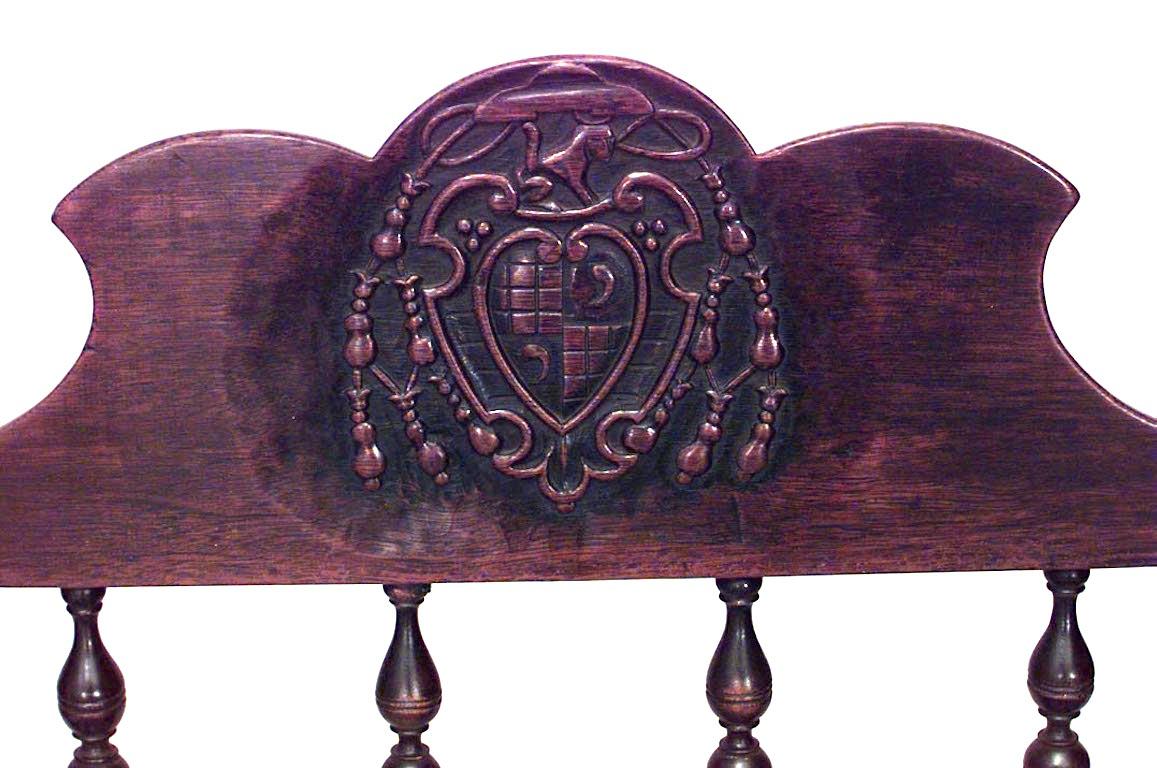Renaissance Revival Set of 7 English Renaissance Spindle and Crest Walnut Armchairs For Sale