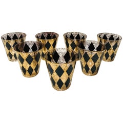 Set of Seven Hollywood Regency Barware Rock Glasses in Gold and Black, 1960s