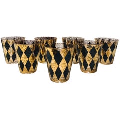 Set of Seven Hollywood Regency Barware Rock Glasses in Gold and Black, 1960s