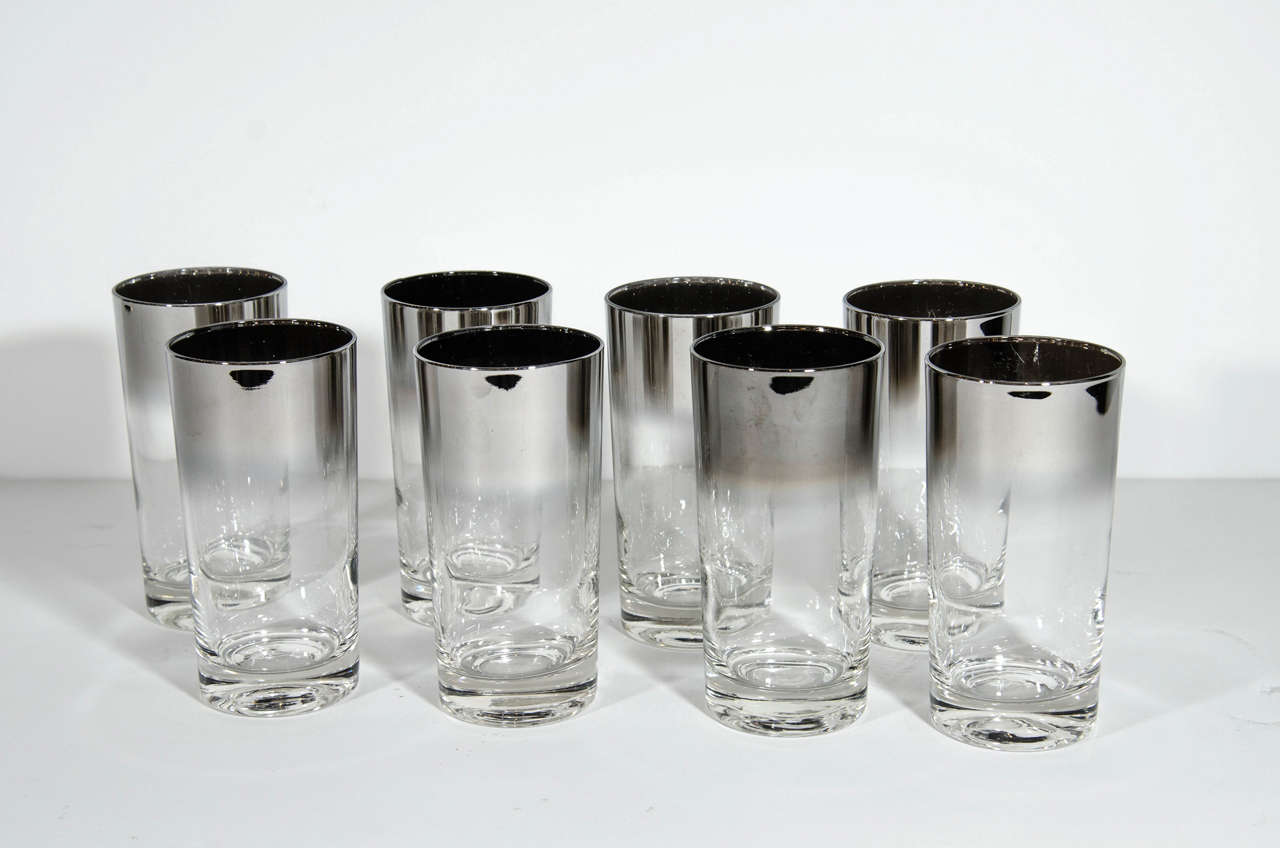 Set of seven vintage Dorothy Thorpe highball or Tom Collins barware glasses with silver overlay rims. Iconic design featuring hues of gradient silver with ombre effect along the top of the glasses.