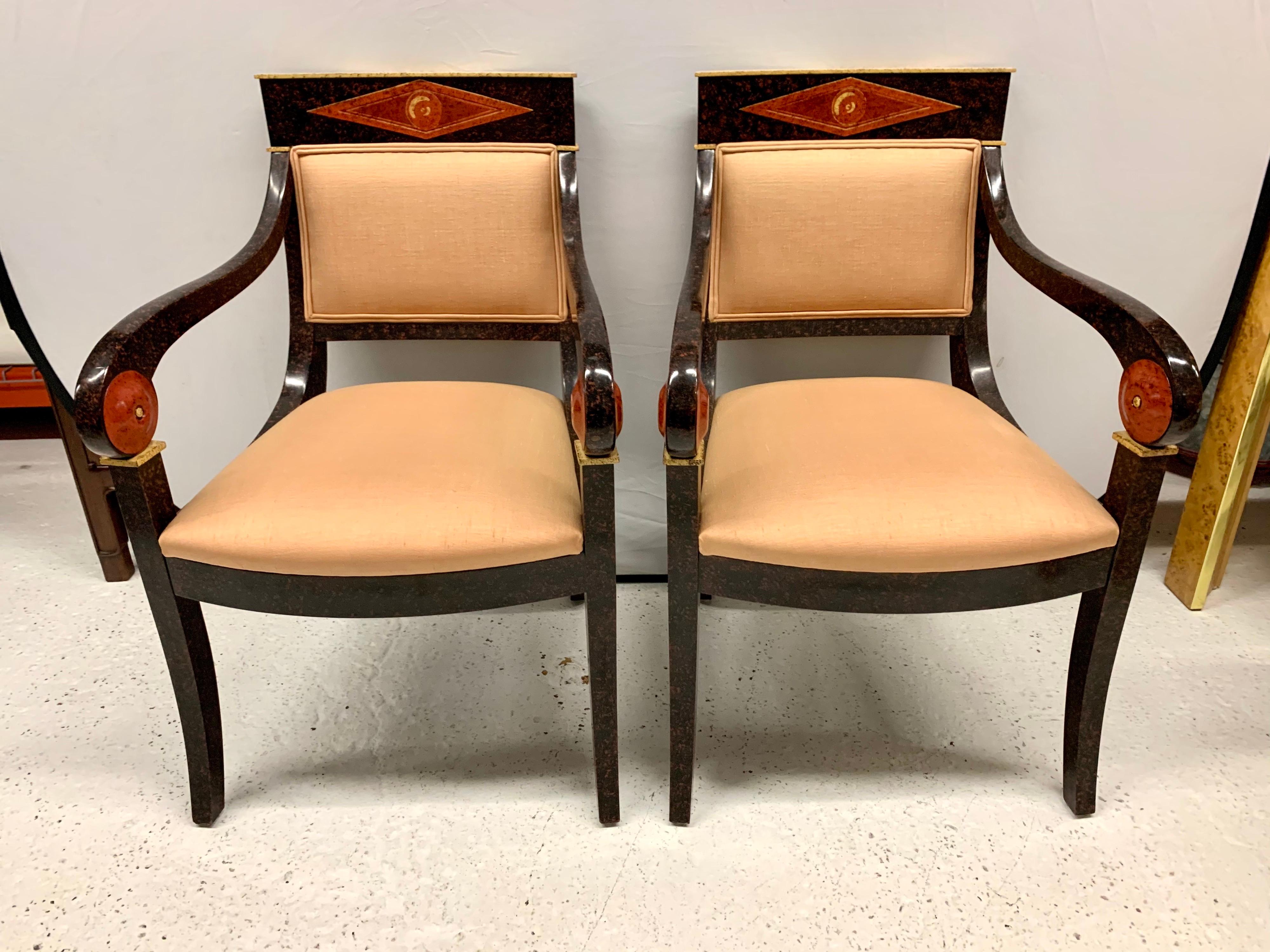 Magnificent set of seven neoclassical dining chairs including three armchairs and four
side chairs, for a total of seven chairs in all. Upholstered seats and backrest. Stunning 
hand painted wood. Now, more than ever, home is where the heart is.