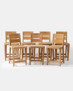 Set of Seven Outdoor Counter Stools in Teak by Sutherland, United States