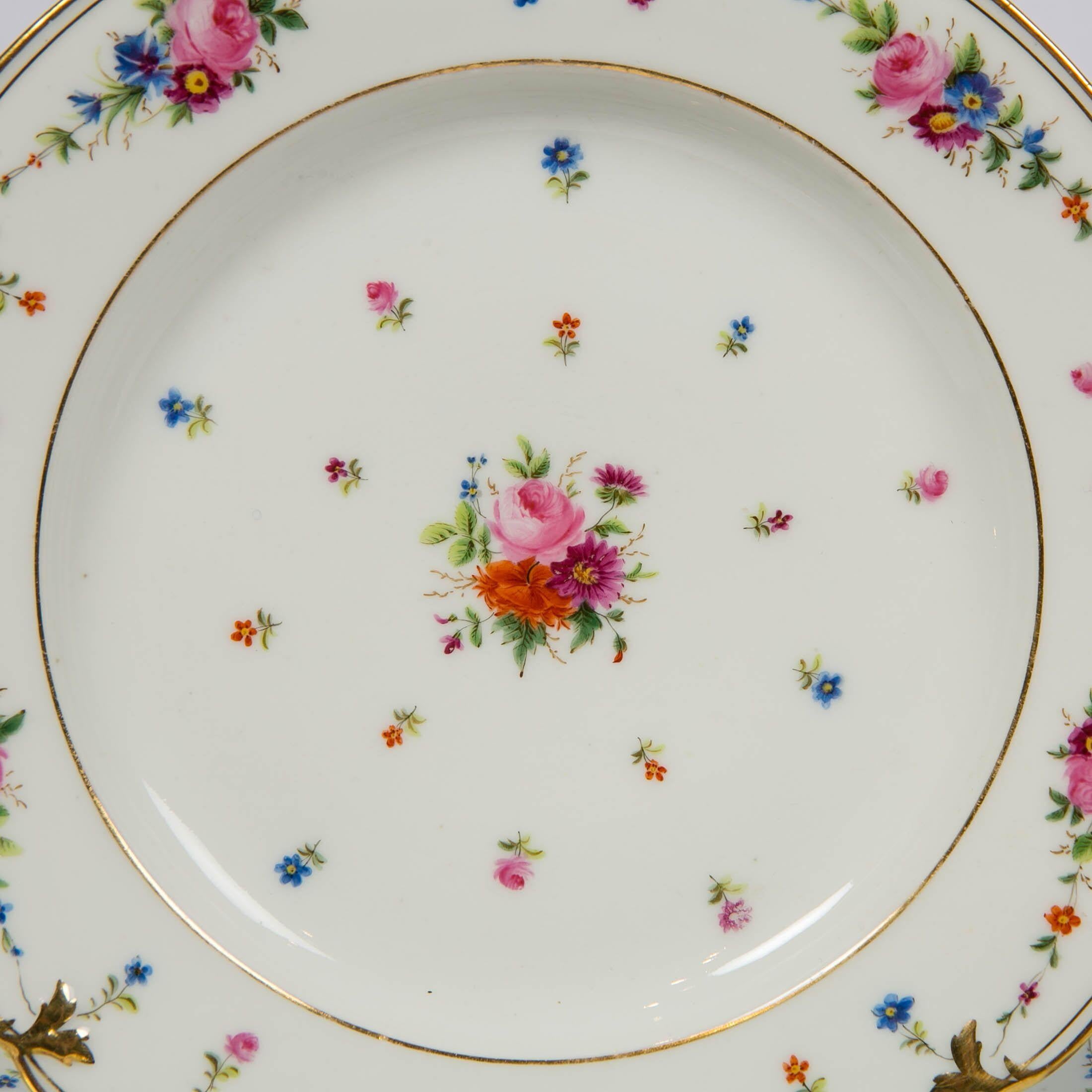 We are pleased to offer this set of seven French dessert dishes made by Eduoart Honoré, circa 1840. Eduoard Honoré was one of the best of the Paris porcelain manufacturers in the first half of the 19th century. These beautiful hand-painted dishes
