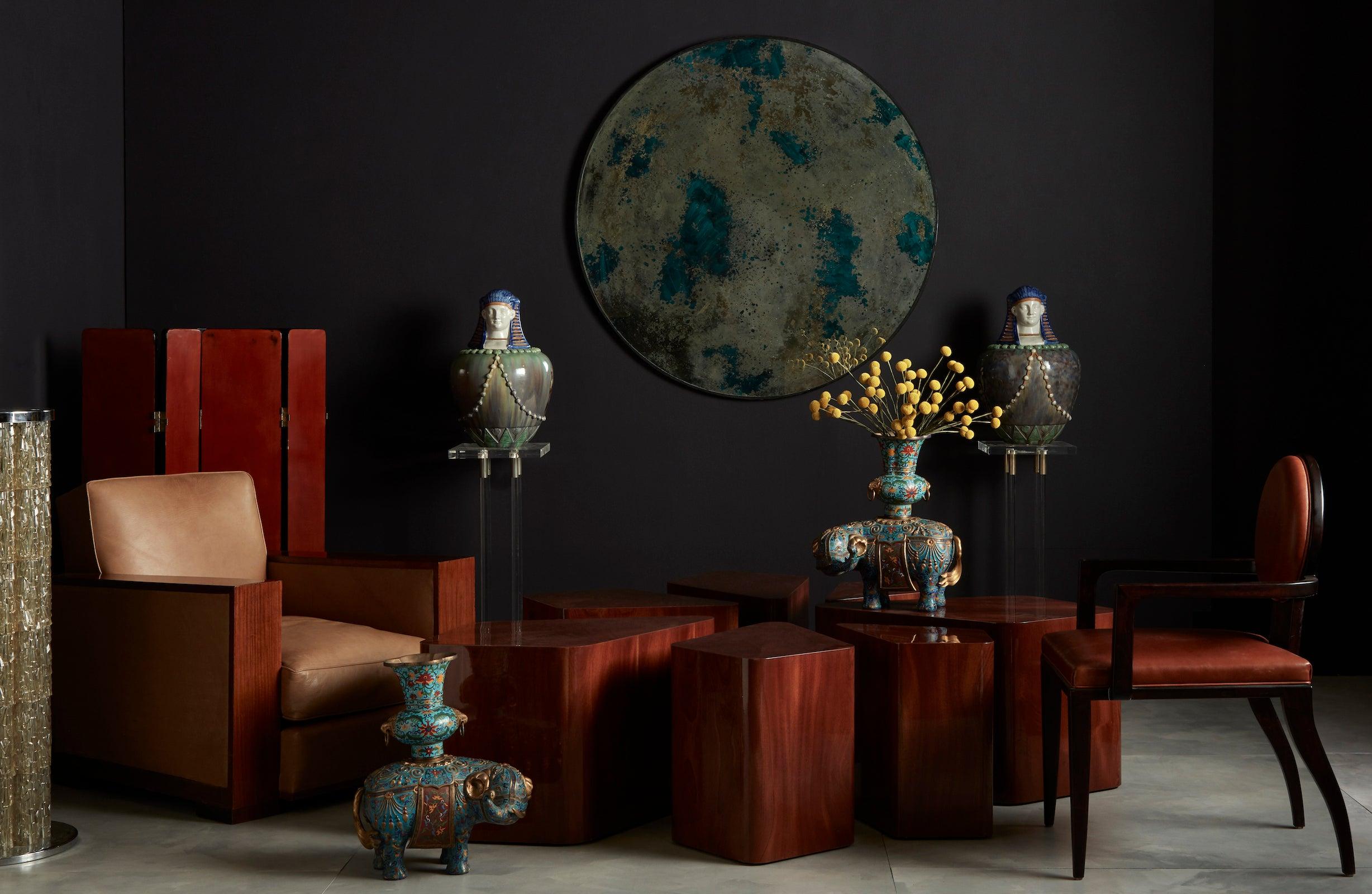 This set is composed of seven petal-shaped side tables of varying sizes made from lacquered maple. Designed by interior designer Juan Montoya, these lacquered wood tables can be arranged together to form a larger flower-shaped table or dispersed