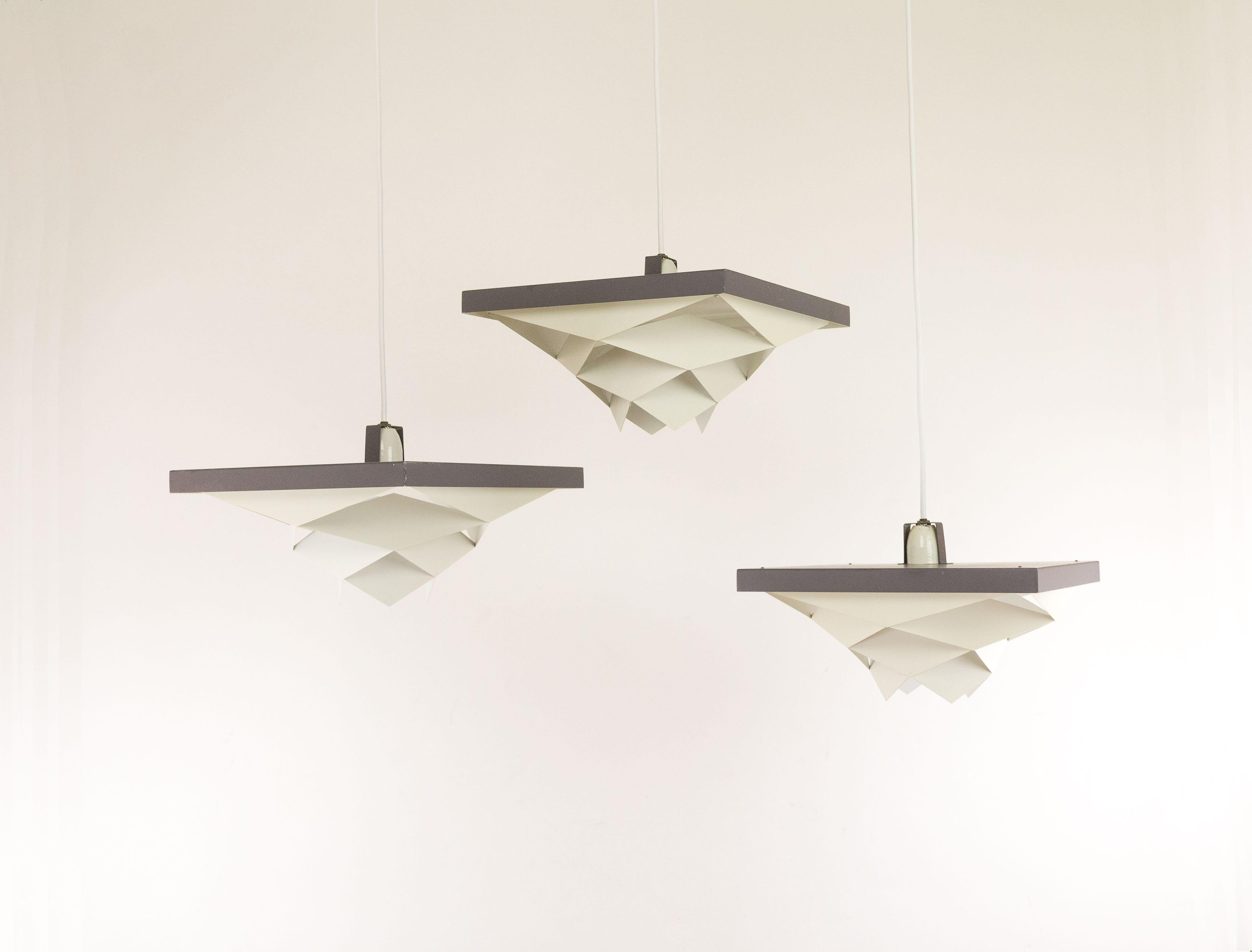 Set of seven Danish midcentury Symfoni pendants, designed by Preben Dahl in the early 1960s and produced by Hans Følsgaard Belysning.

Originally the lamps were part of a series of similar ceiling lights and pendants that were made of white and
