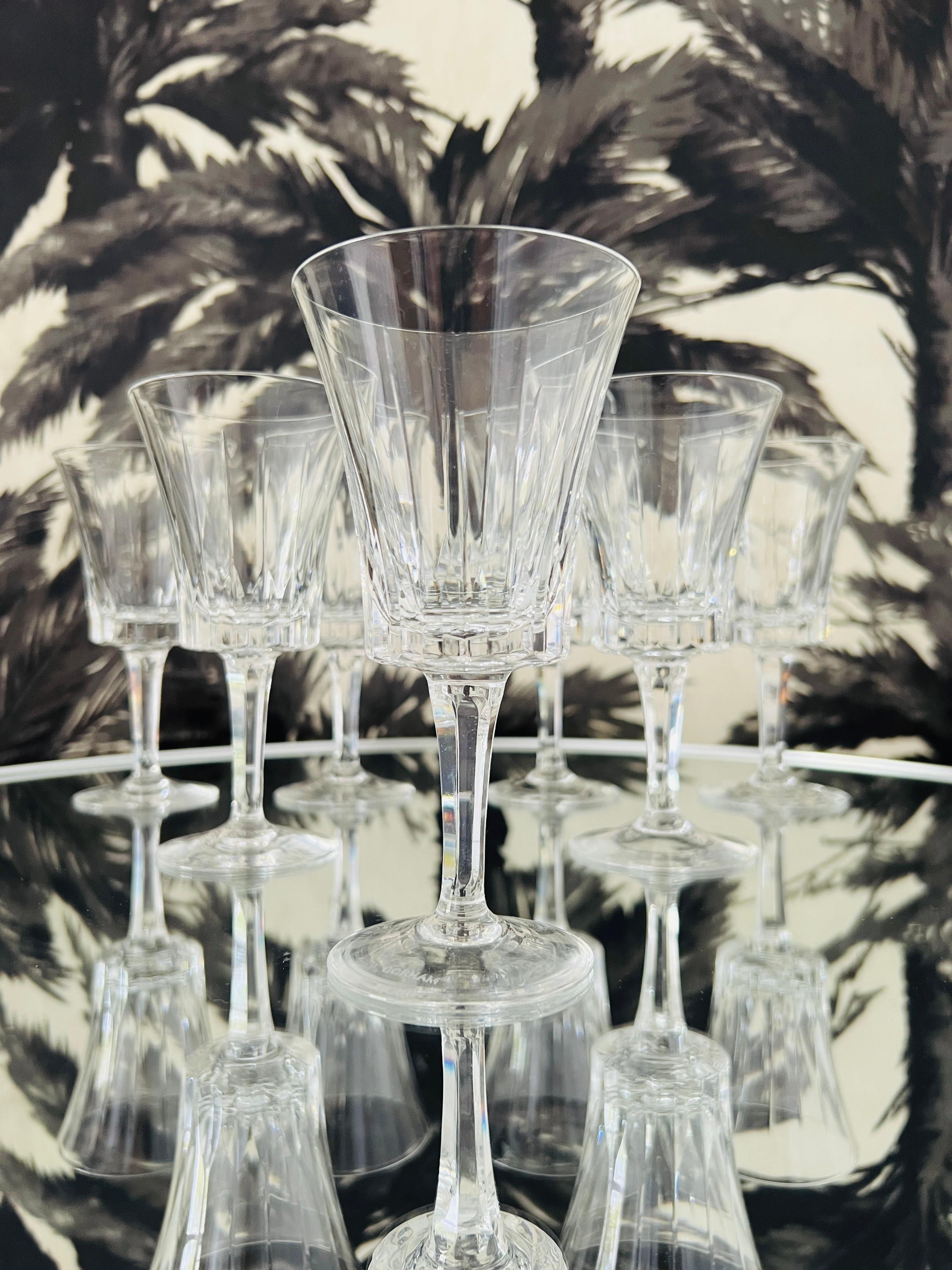 Vintage set of crystal stemware by Gorham, c. 1970.  The elegant blown glass wine goblets feature etched vertical cuts along the bowls and have faceted multi-sided stems which reflect like prisms.  The glasses have a beautiful weight to them and are