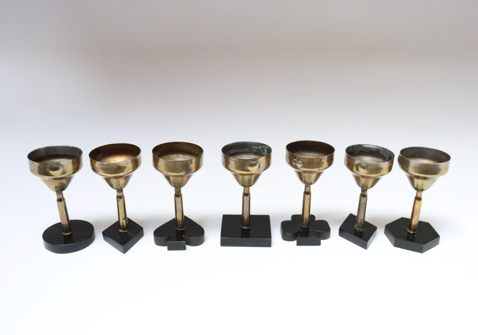 Folk Art Set of Seven Vintage Trench Art Brass Goblets with Bakelite Card Suit Bases For Sale