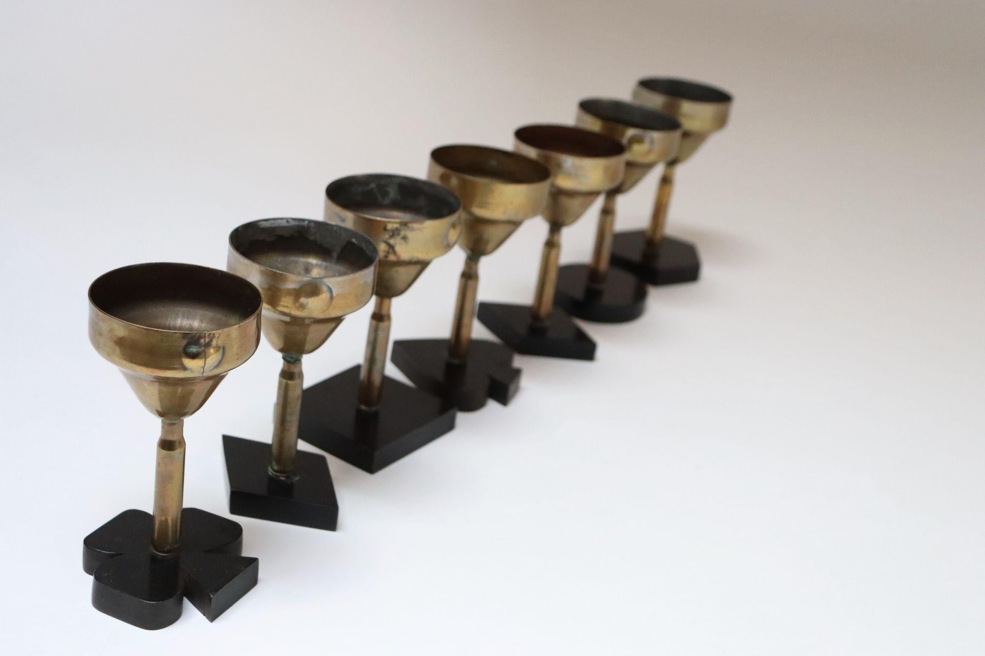 Set of Seven Vintage Trench Art Brass Goblets with Bakelite Card Suit Bases In Good Condition For Sale In Brooklyn, NY