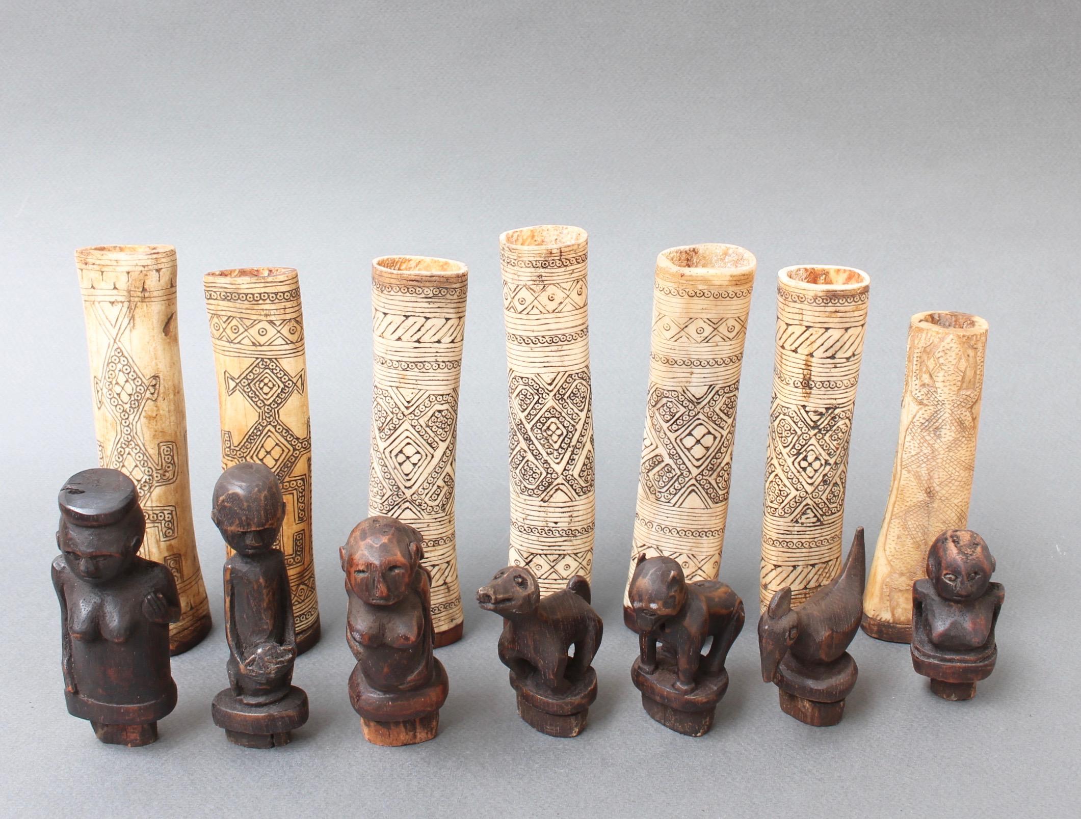 Indonesian Set of Seven Wood and Bone Lime Powder Holders for Betel Nut from W. Timor
