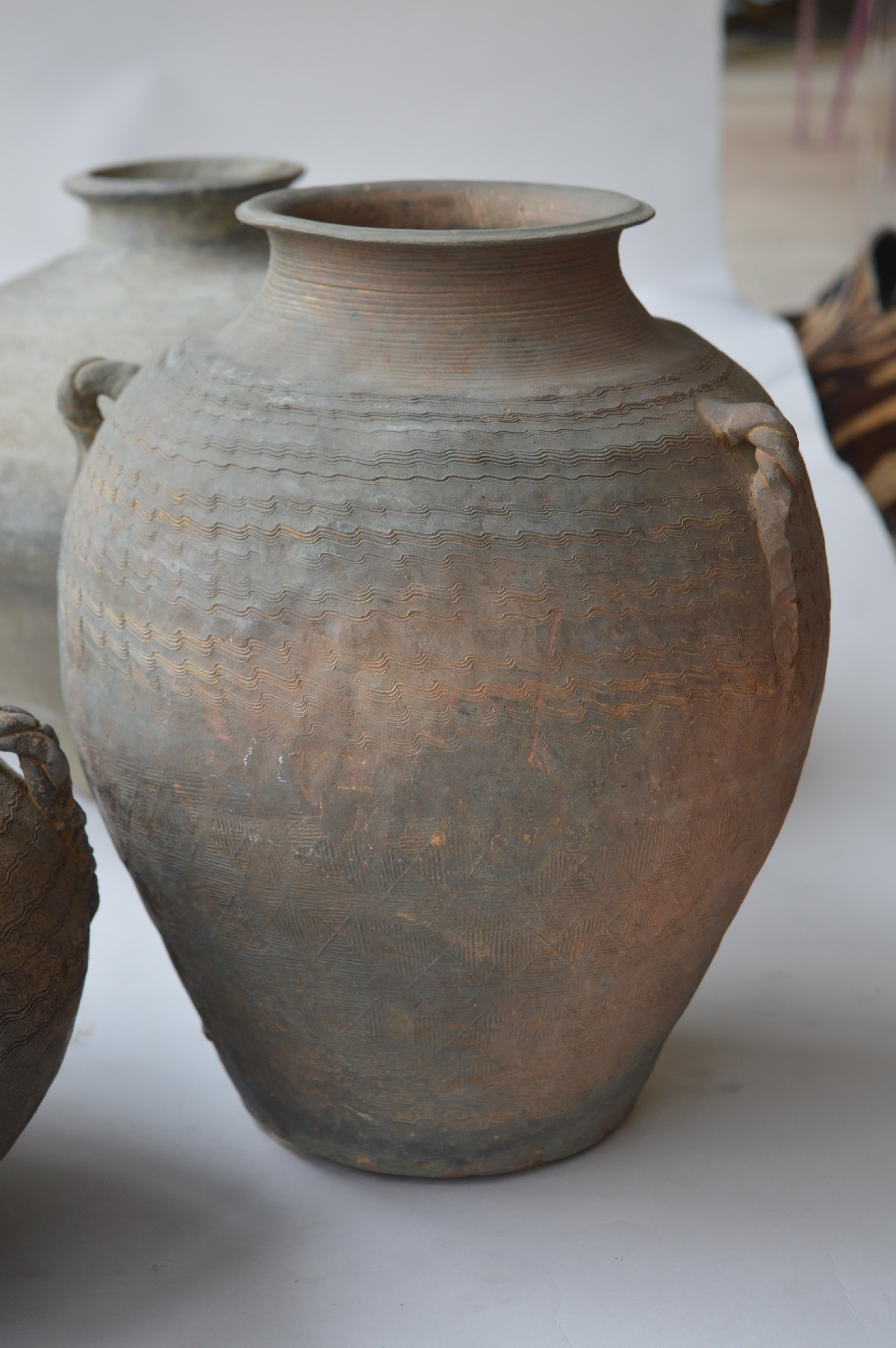 Stoneware Set of Seven Zhou Dynasty Vases