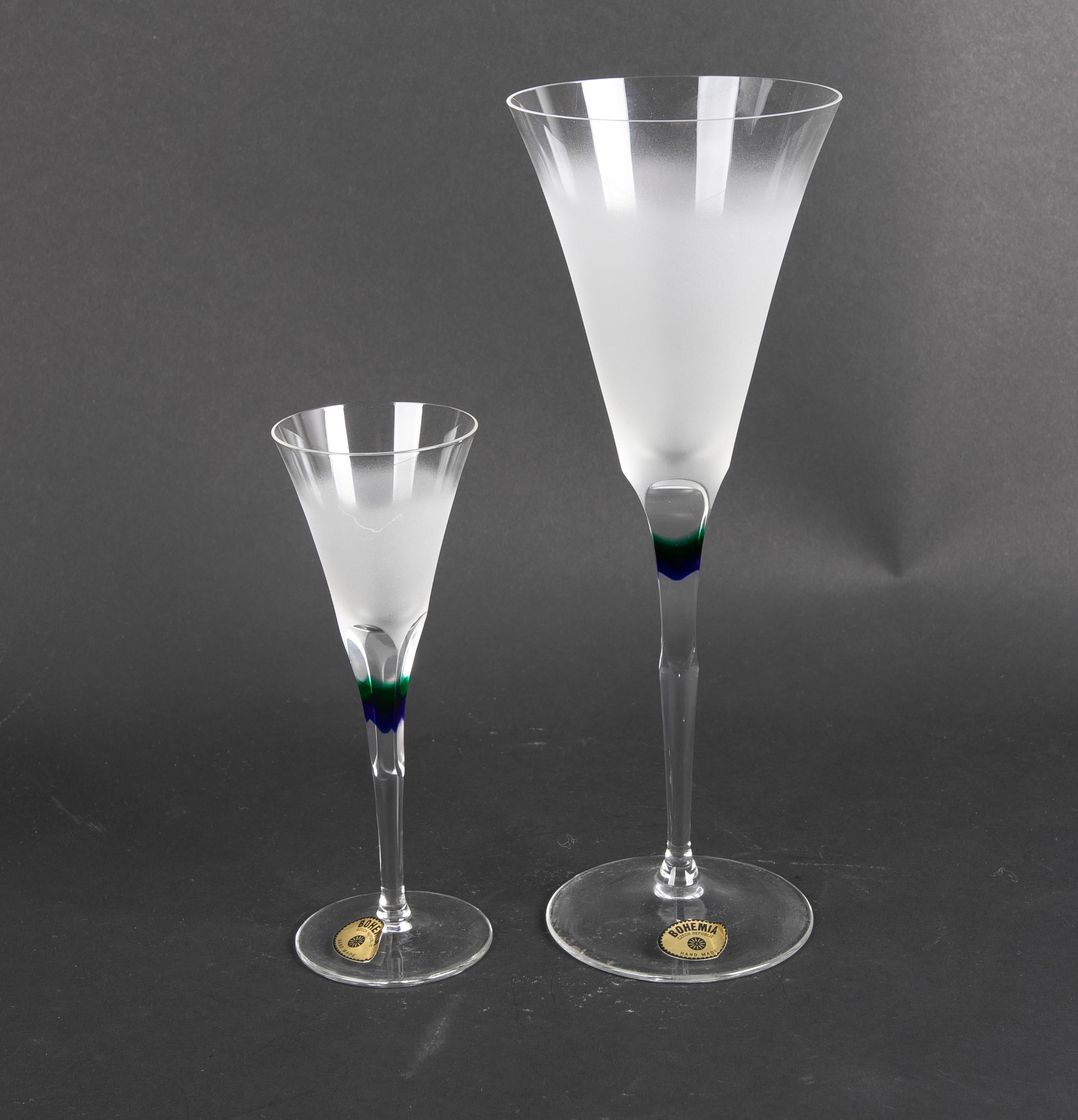 Set of Seventeen Bohemian Crystal Glasses with Coloured Decoration
There are 5 of the small glass
There are 12 of the large glass.