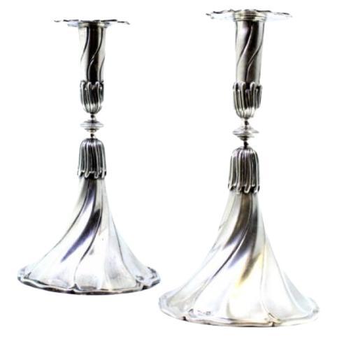 Set of silver candlesticks with embossed stems and cut-out sconces For Sale