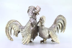 Set of silver fighting roosters with reliefs and applications