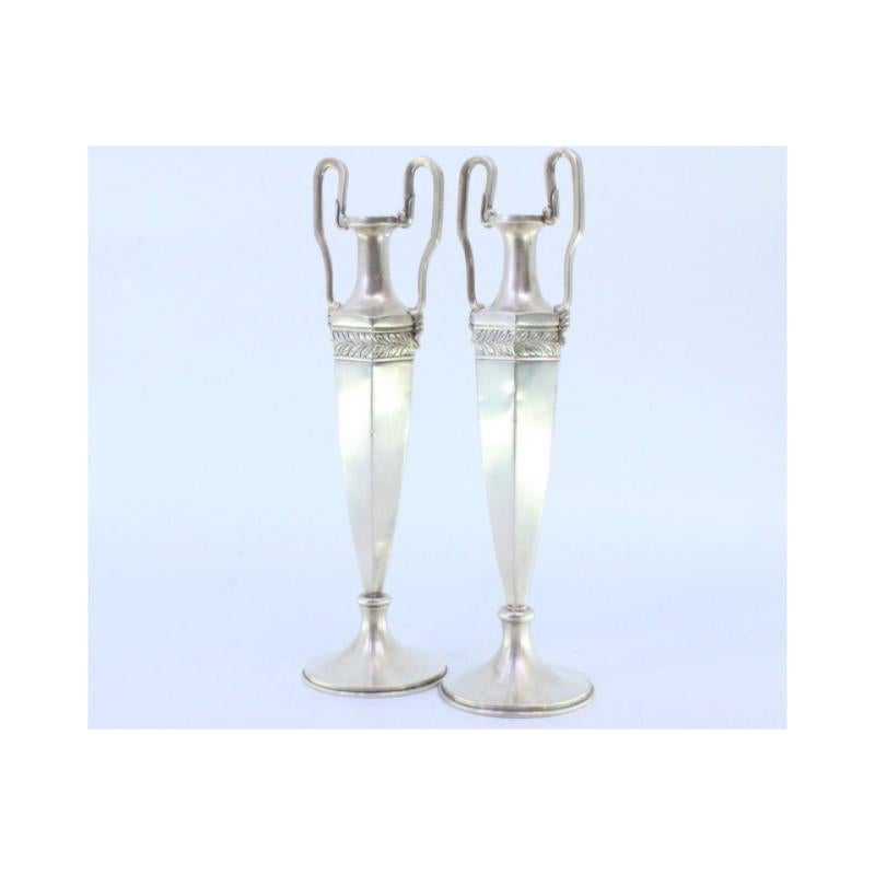 European Set of silver jugs with friezes on the structure and two raised handles For Sale