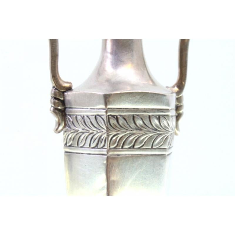 Silver Set of silver jugs with friezes on the structure and two raised handles For Sale
