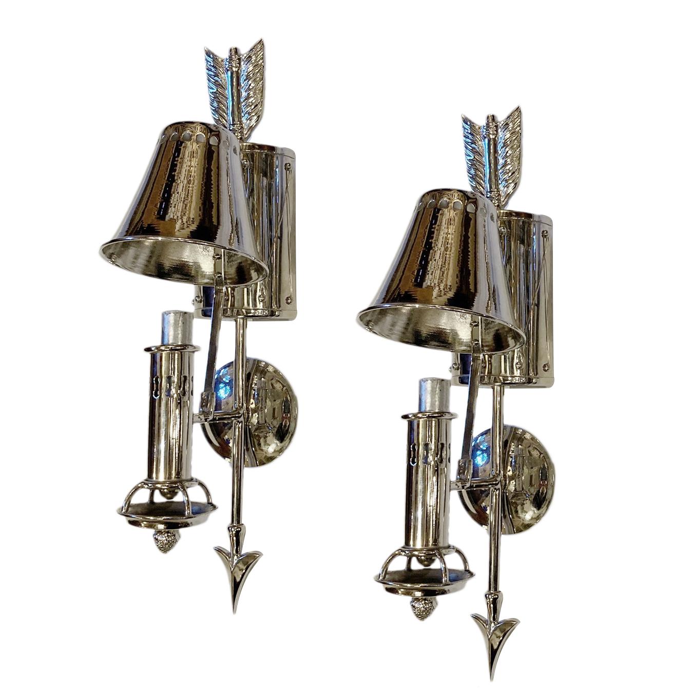 Set of four circa 1940's French silver-plated metal sconces with drum and arrow design. Sold per pair.

Measurements:
Height: 19