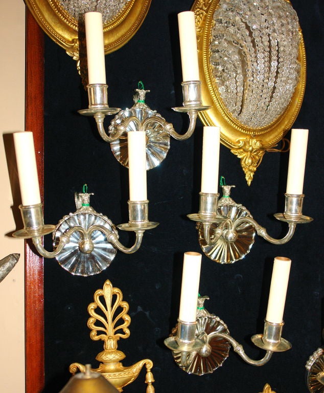 Early 20th Century Set of Silver Plated Mirrored Sconces, Sold Per Pair For Sale
