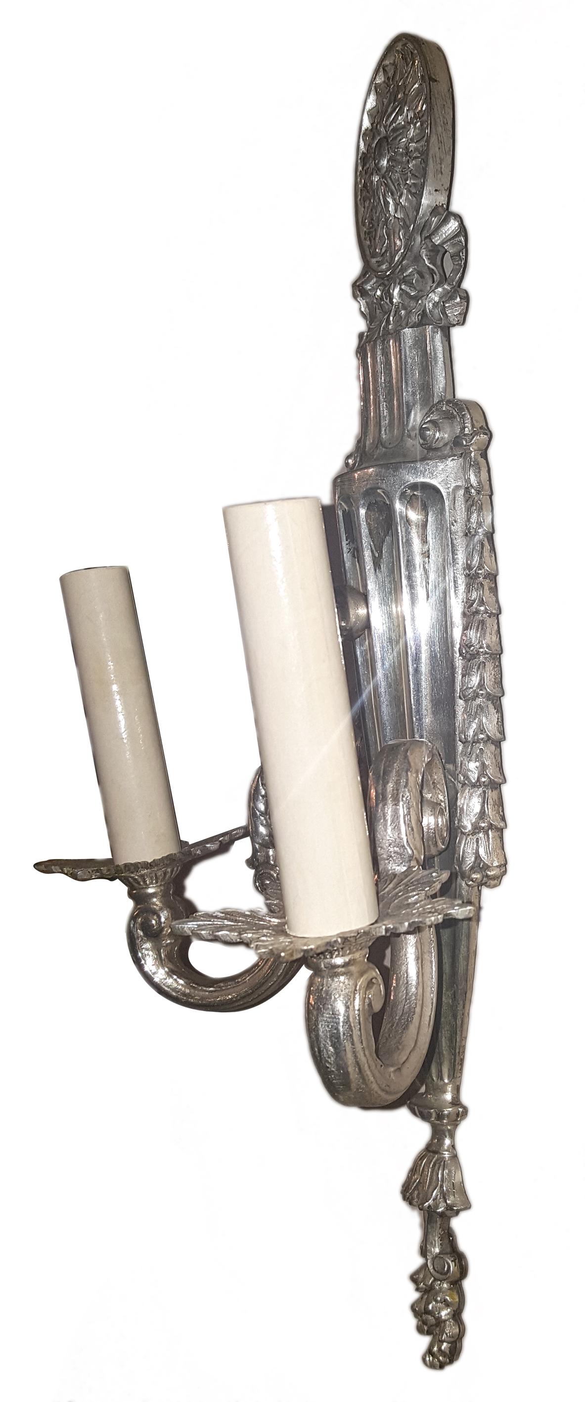 A set of four circa 1920s English silver plated neoclassic style sconces.
Measurements:
Height 17