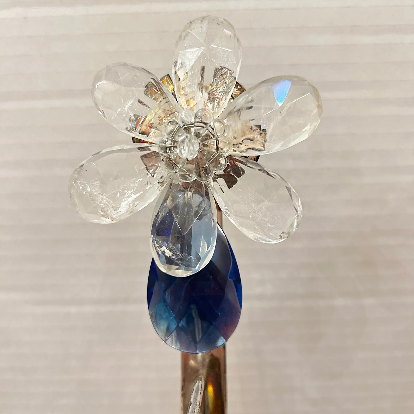 Set of four French circa 1940's silver-plated sconces with blue crystal and rock crystal flowers. Sold per pair.

Measurements:
Height: 21.75