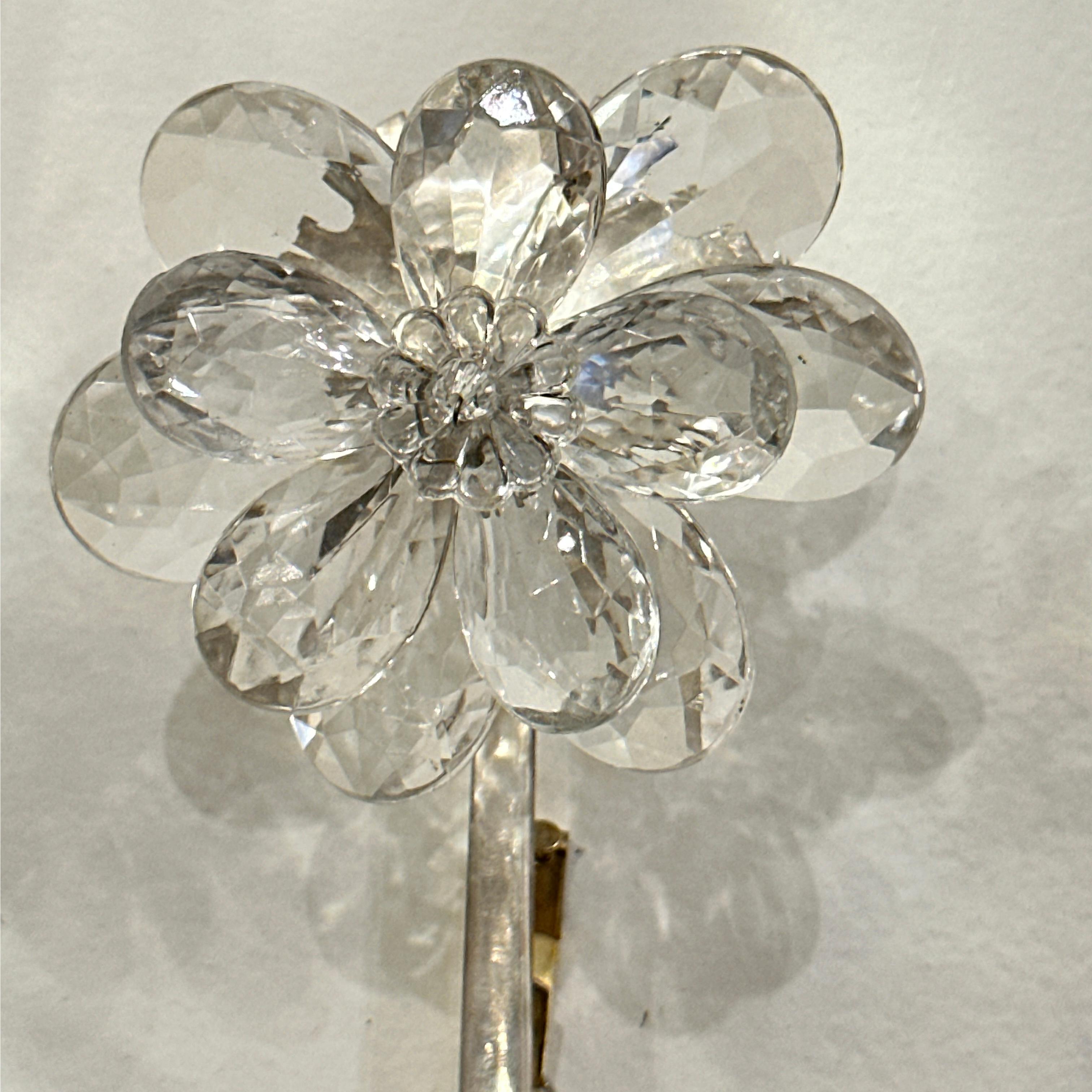 Set of 4 silver-plated, circa 1930's sconces with mirrored leaves and crystal flowers. Sold per pair.

Measurements:
Height: 21