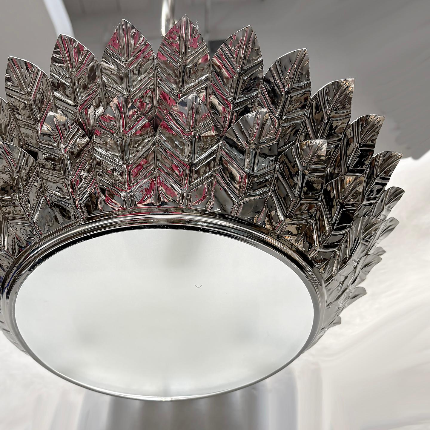 Frosted Set of Silver Sunburst Light Fixtures, Sold Individually For Sale