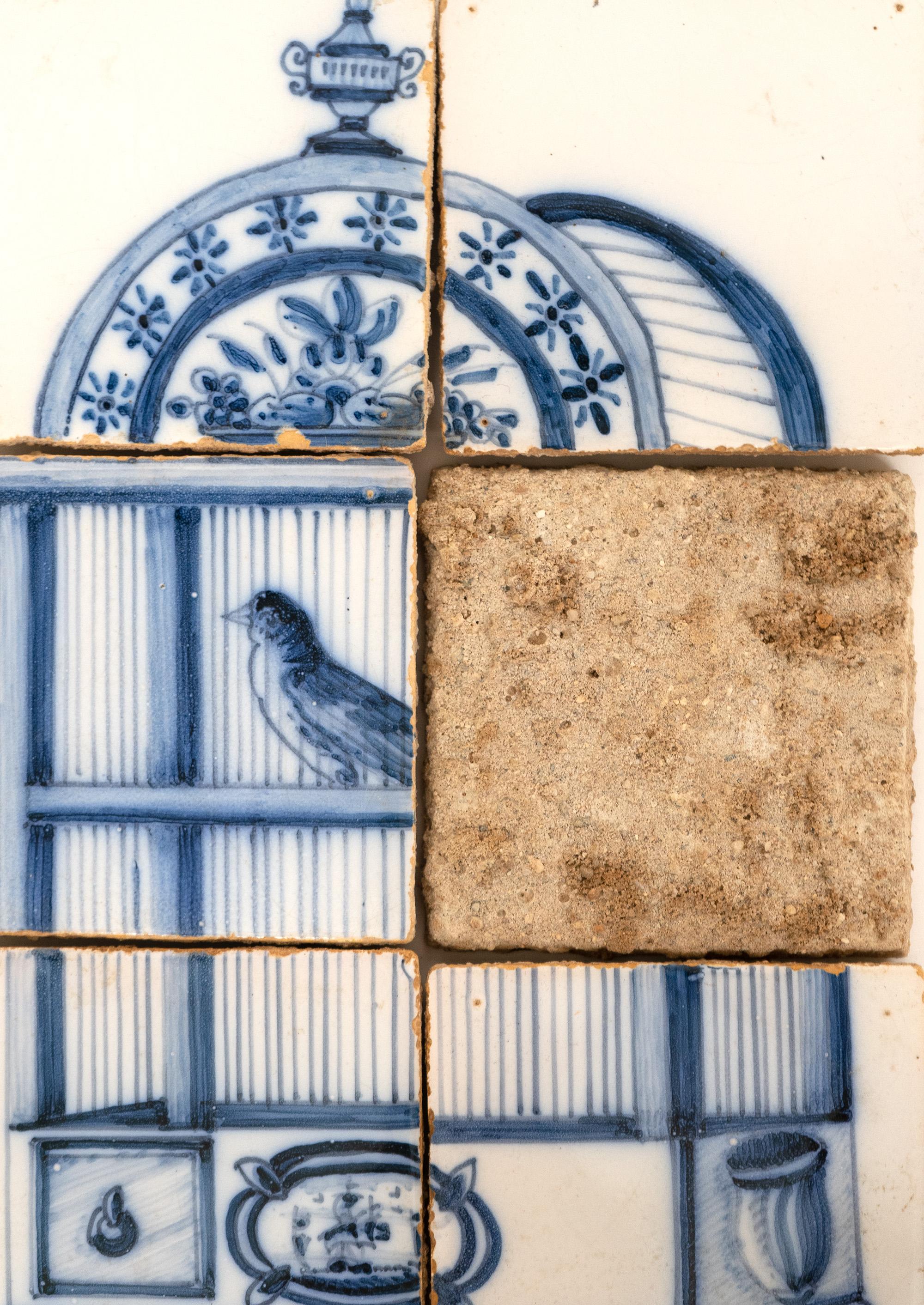 Blue and white set of 6 Delft ceramic tiles.

15.25 x 10 in.
