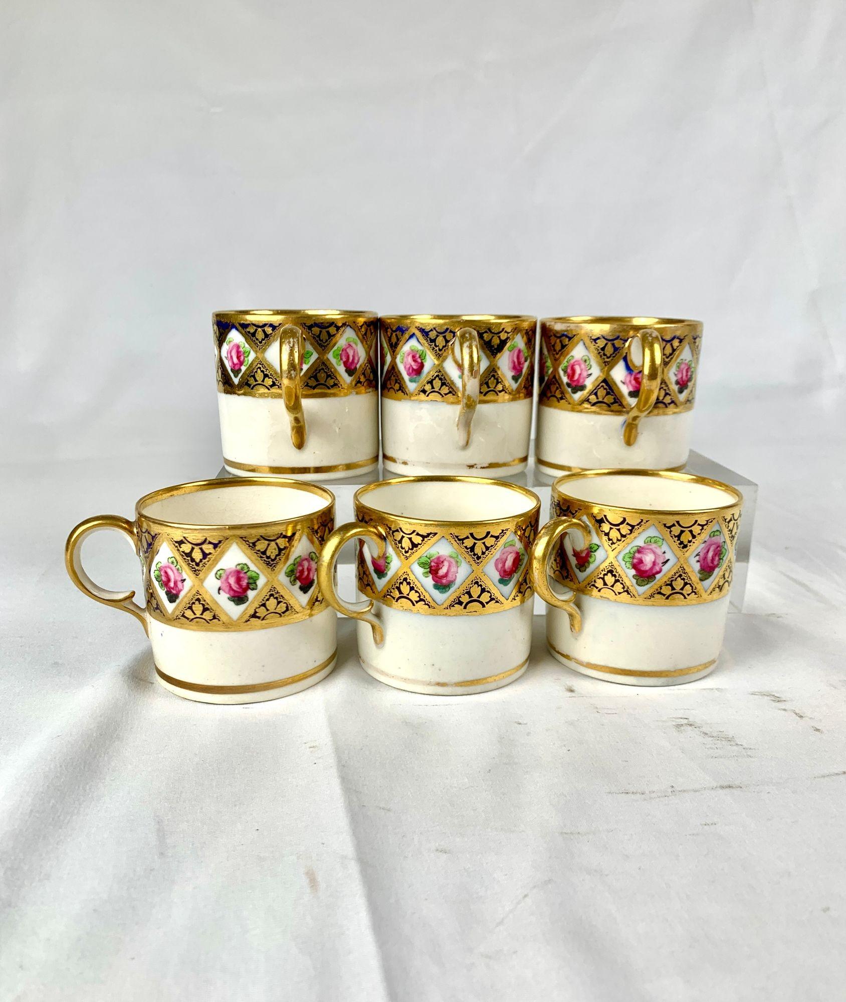 This set of six late 18th-century English porcelain espresso cups was hand painted.
Traditionally known as coffee cans, they were made by the Derby factory circa 1790.
Each cup is decorated with diamond-shaped panels with delicate pink roses framed