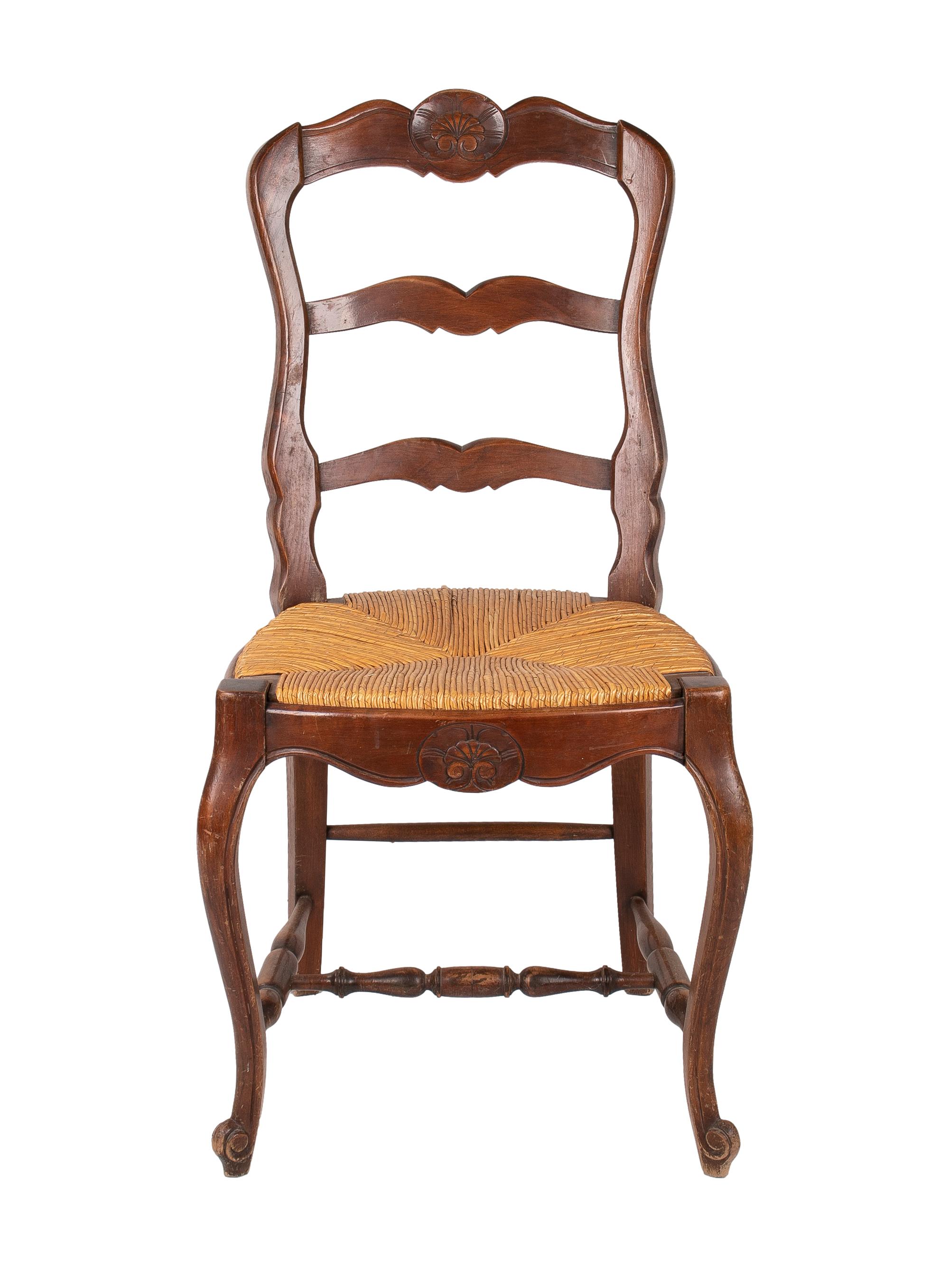 Set of six rustic 1940s Spanish wooden rope bottomed chairs.