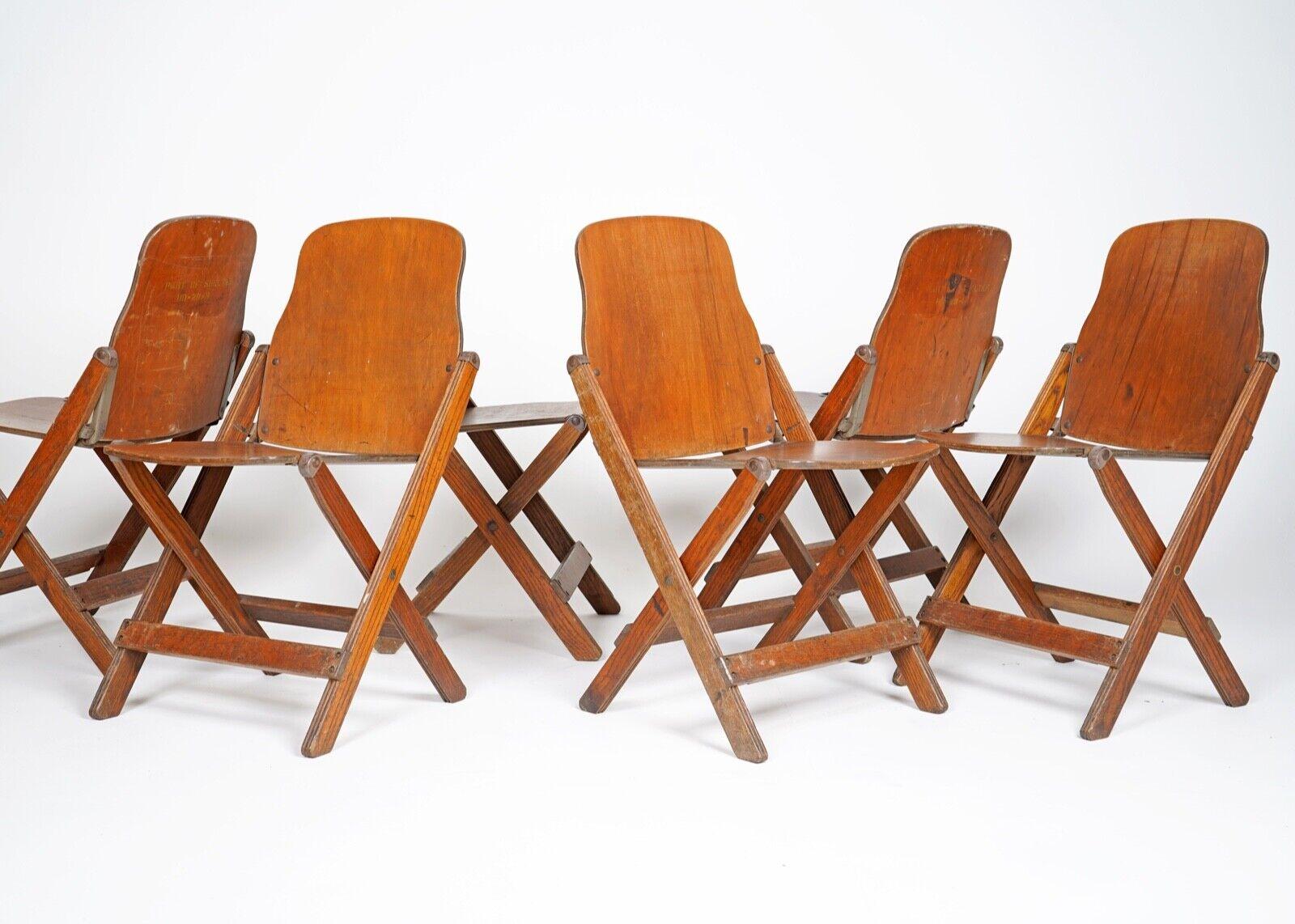 Set of 6 folding chairs made by American Seating Company, Grand Rapids Michigan.
Fantastic utilitarian chairs that cleverly fold down so you can store them tidily away.
Being made for the American army they are very well made sturdy chairs 
All