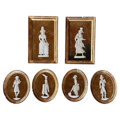 Conjunto de seis figuras de resina enmarcadas de los años 50