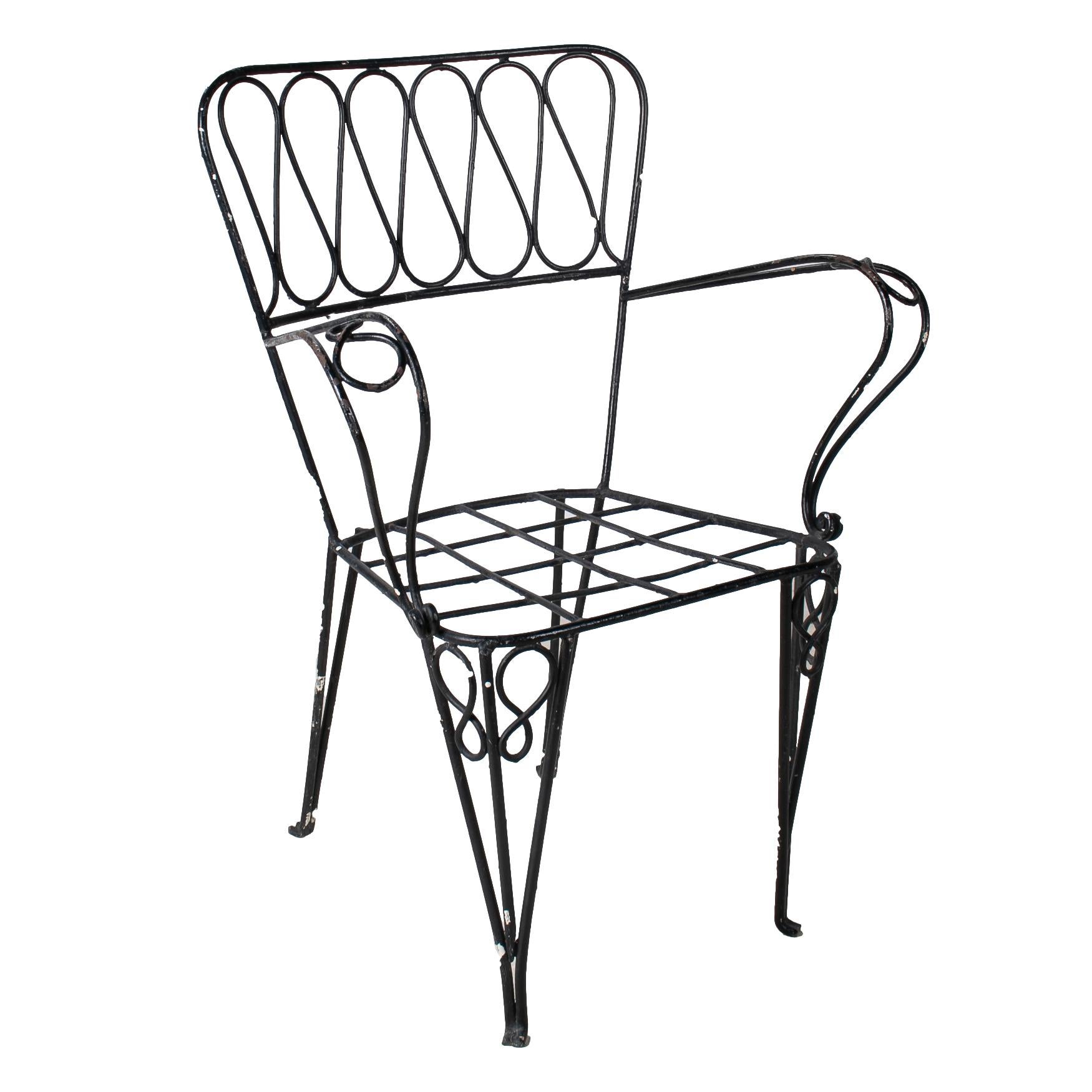 Set of six 1970s French iron garden chairs.