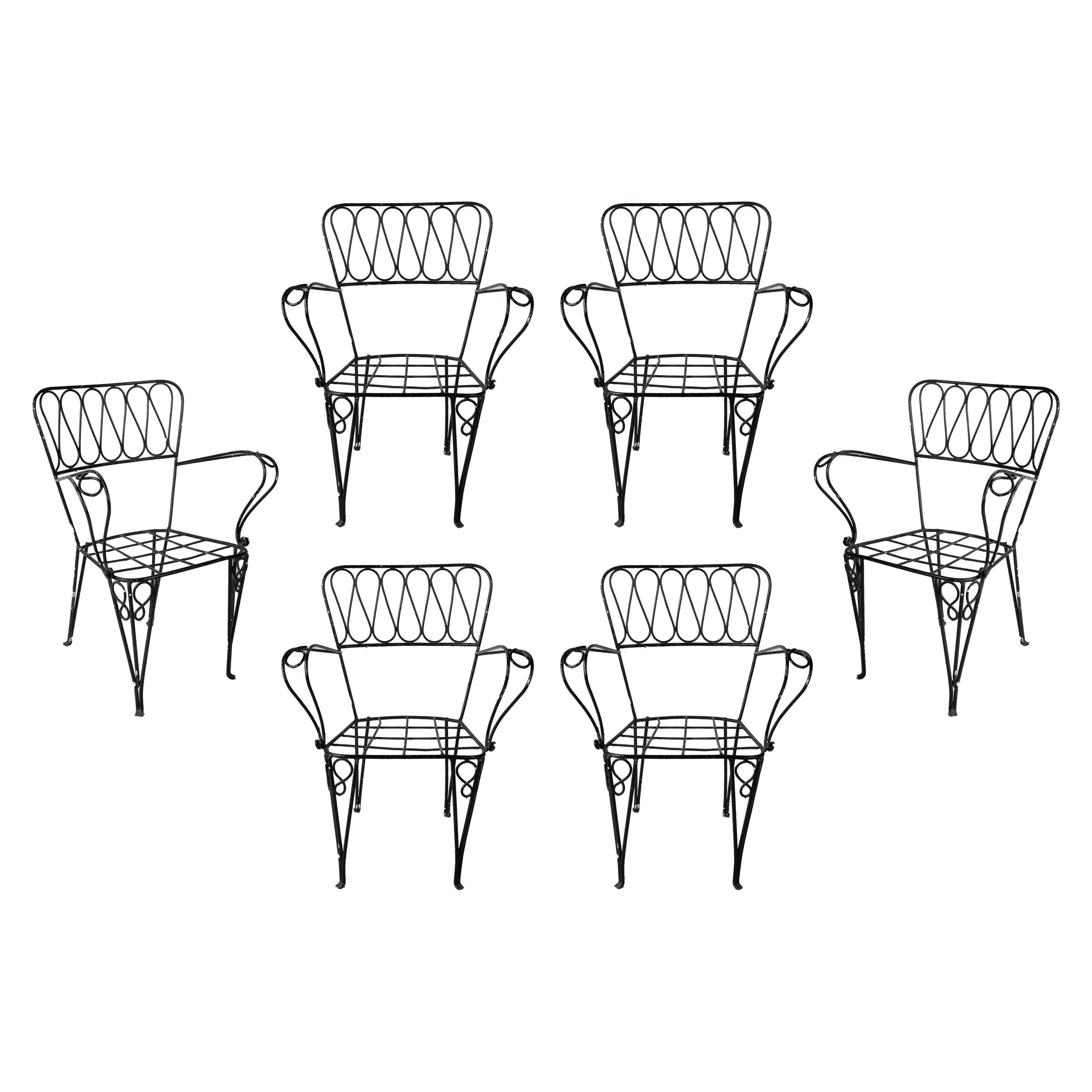 Ensemble de six chaises de jardin en fer des années 1970.