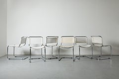 Conjunto de seis sillas voladizas de los años 70 de estilo Matteograssi, cromadas y de cuero blanco