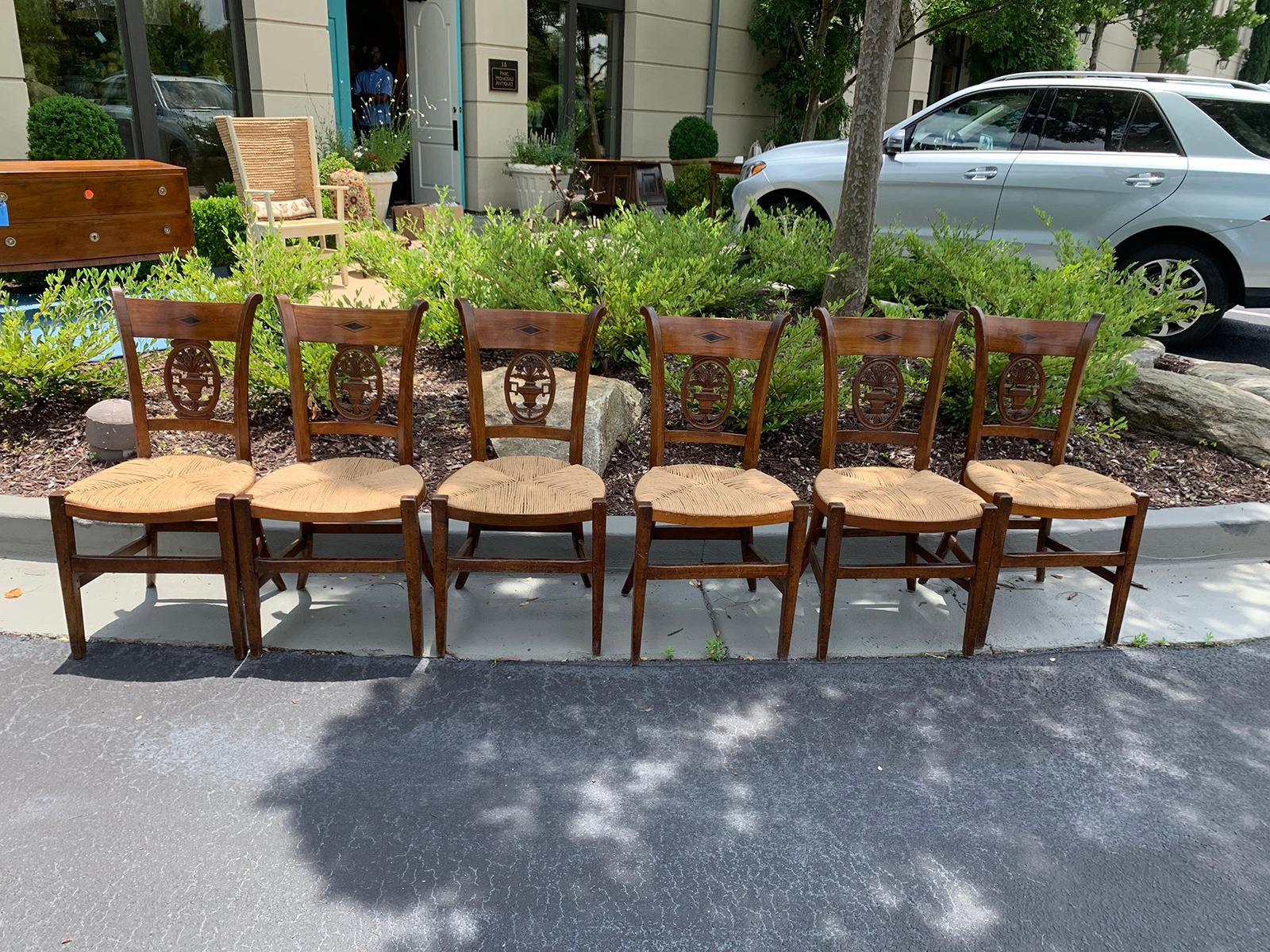 Set of six 19th-20th century French country side chairs with rush seats
Beautiful carving.
Measures: 17.75