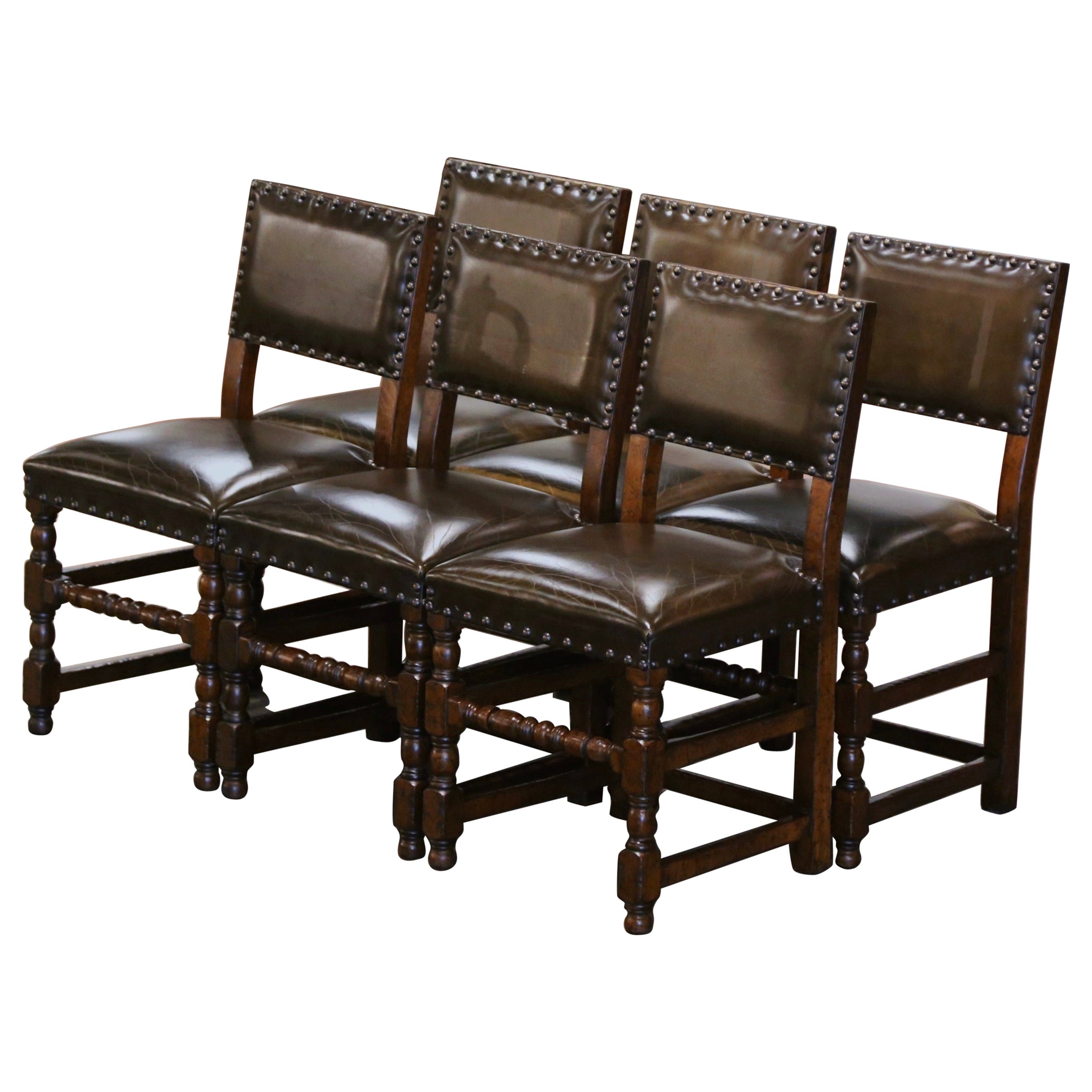 Ensemble de six chaises françaises du 19ème siècle en chêne sculpté et tapissées de cuir