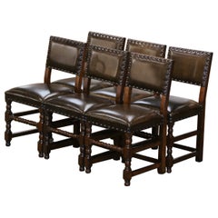 Ensemble de six chaises françaises du 19ème siècle en chêne sculpté et tapissées de cuir