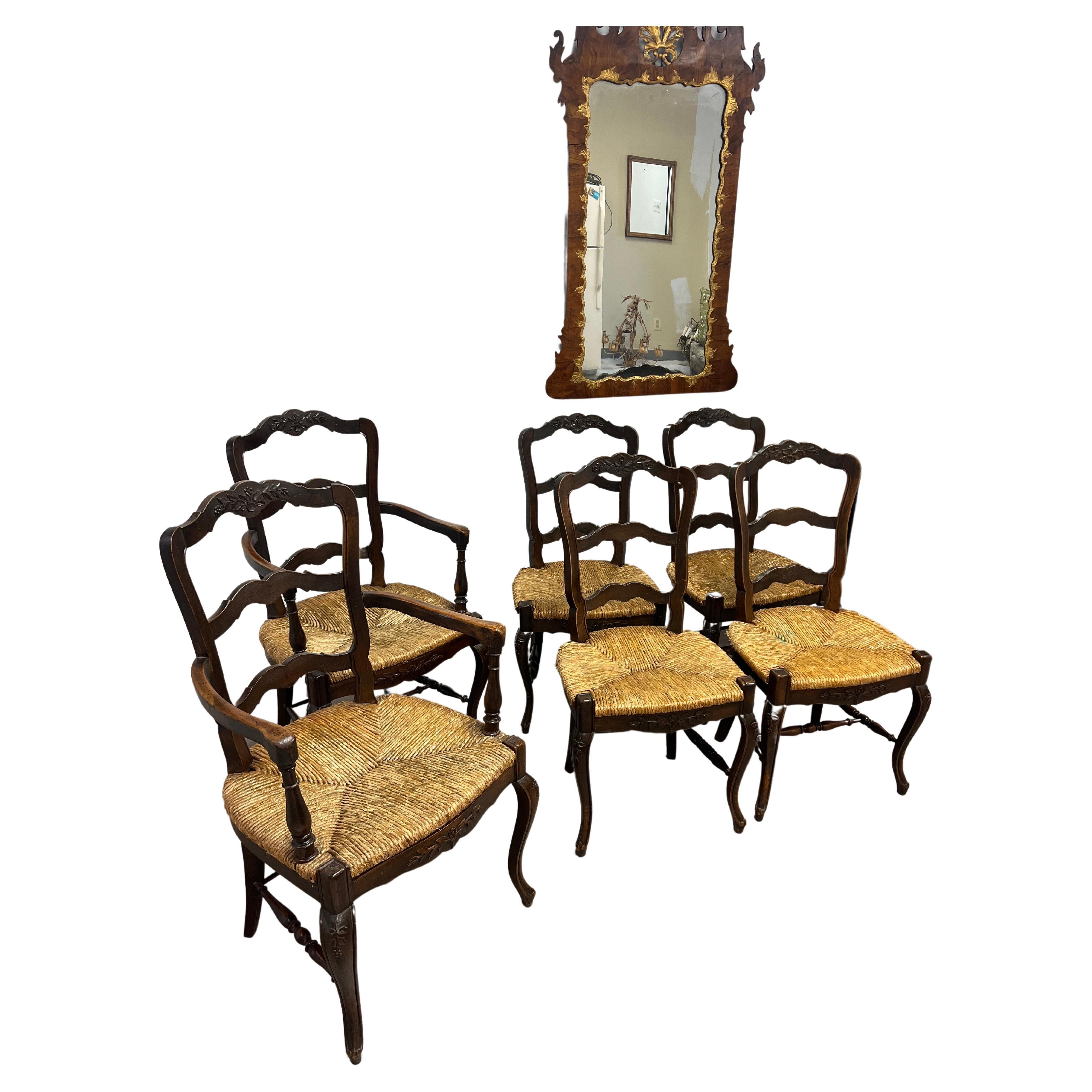 Featuring a handsome set of six French Provincial chairs. The set includes two armchairs measuring 38