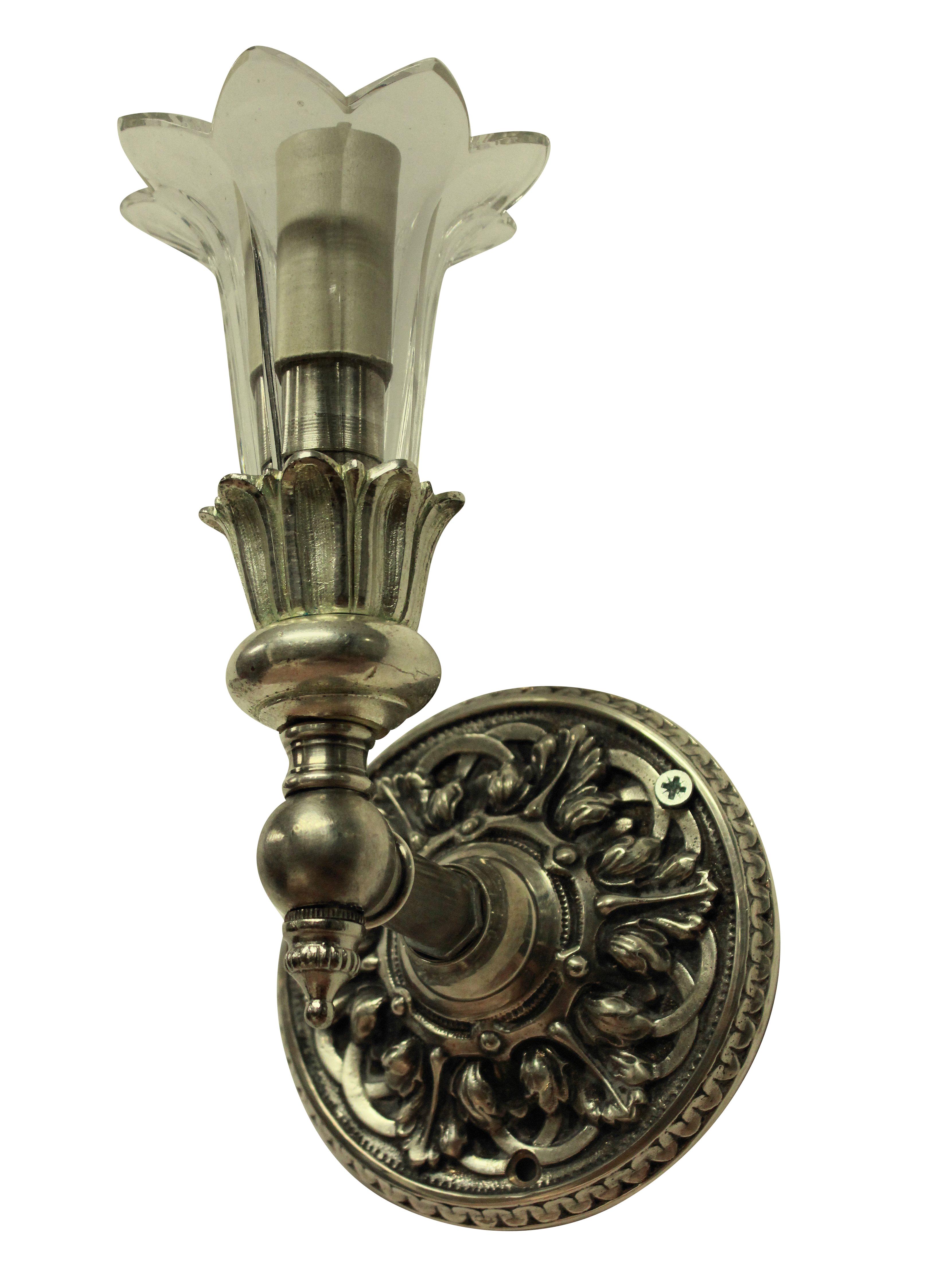 A set of six unusual French silver plated bronze single arm wall sconces with a tulip shaped cut glass nozzel. Formerly gasoliers.