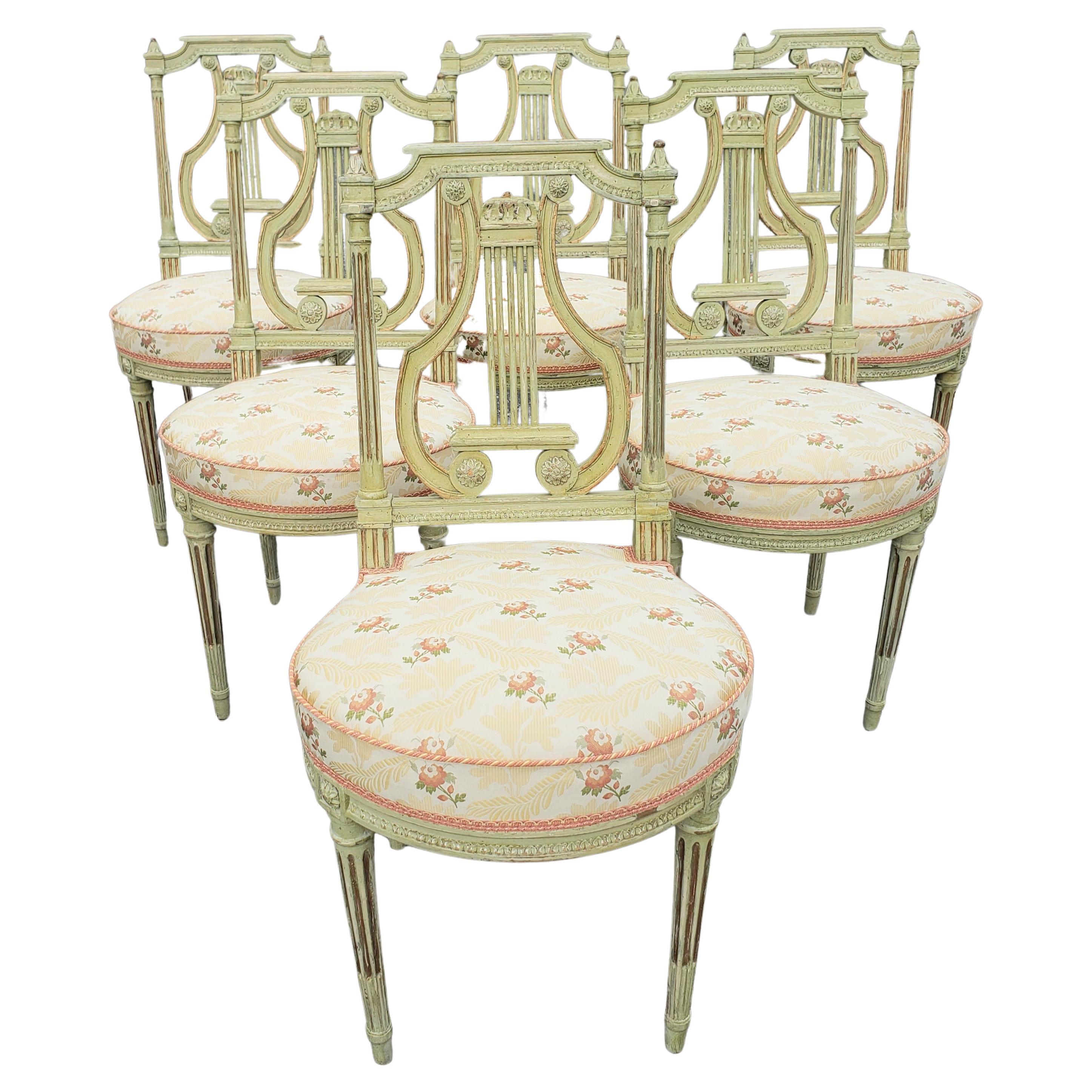 An exquisite, incredible Set Of Six Louis XVI Style Green Parcel Gilt Painted Dining Chairs in great antique condition. Seats are very firm and upholstery in great condition. Chair are heavy, solidly built with giggles of any kind.
Measures 17