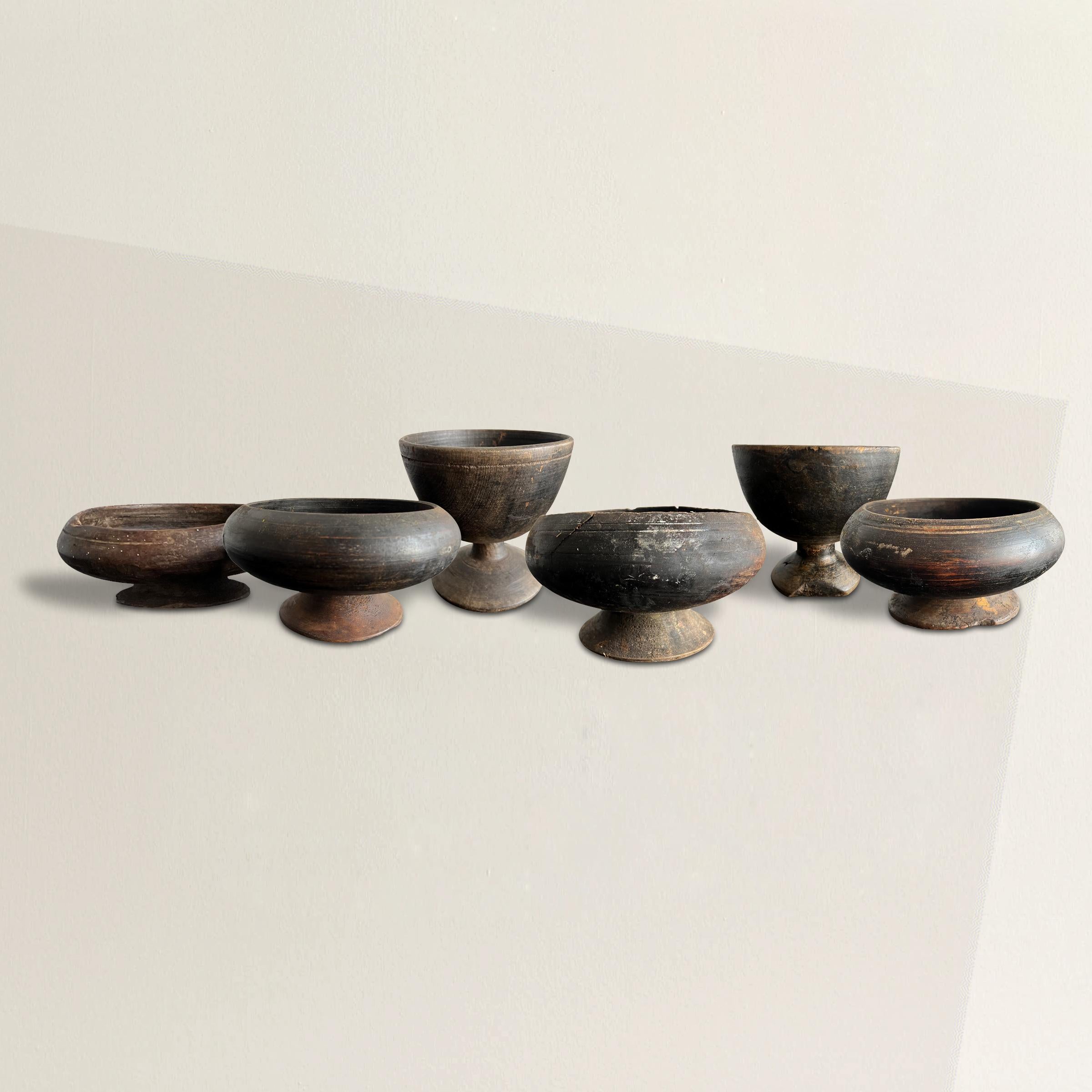 A remarkable set of six 19th century Tibetan Buddhist alms bowls originally used by monks to collect food and money donations from patrons of their temple. Now, they're a wonderful reminder that giving is better than receiving. Dimensions listed are