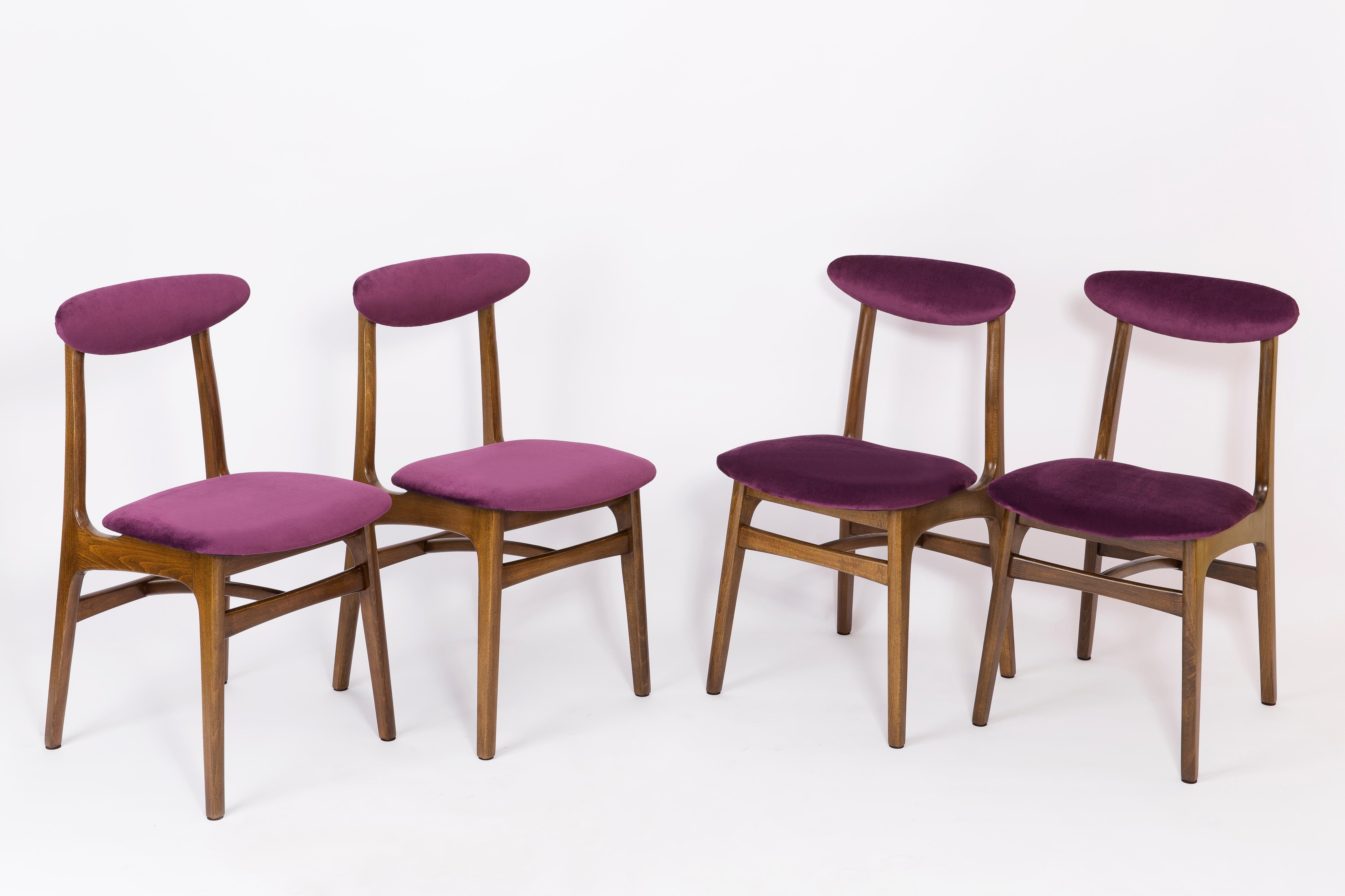 Chairs designed by prof. Rajmund Halas. They have been made of beechwood. They have undergone a complete upholstery renovation, the woodwork has been refreshed. Seats and backs were dressed in a plum (color 969), durable and pleasant to the touch