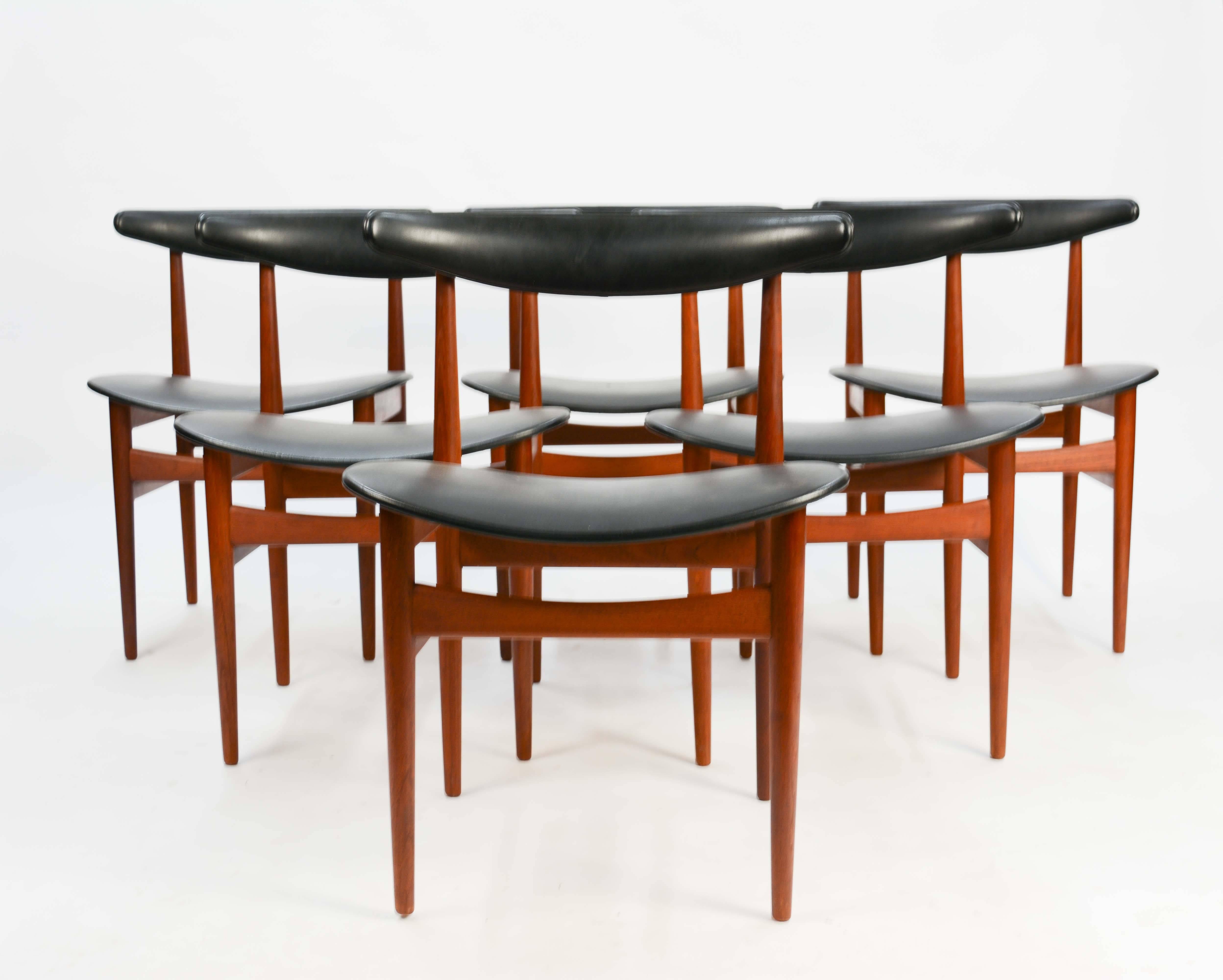 The Model 218A's in the manner of Poul Hundevad for Vamdrup Stolefabrik, Denmark, 1965. The chairs are in excellent vintage condition. The surround backs and wide seats make these chairs and excellent choice for those who want to entertain long