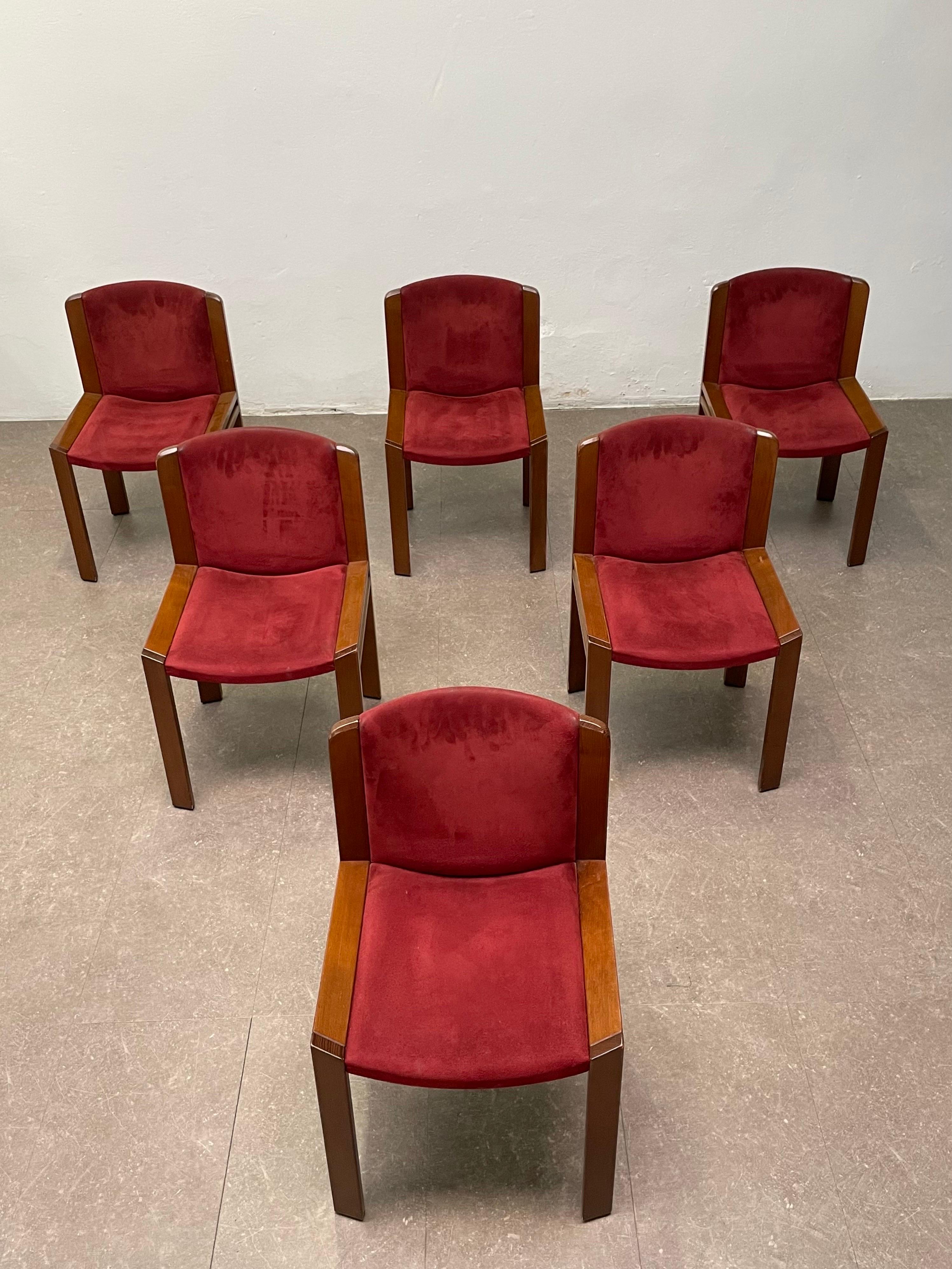 Joe Colombo for Pozzi, set of 6 dining chairs model '300', red suede and oak, Italy, 1960s.

Functionalist set of dining chairs is designed by Joe Colombo in 1966. His fascination with functionality meant he always focused on the user, which lead