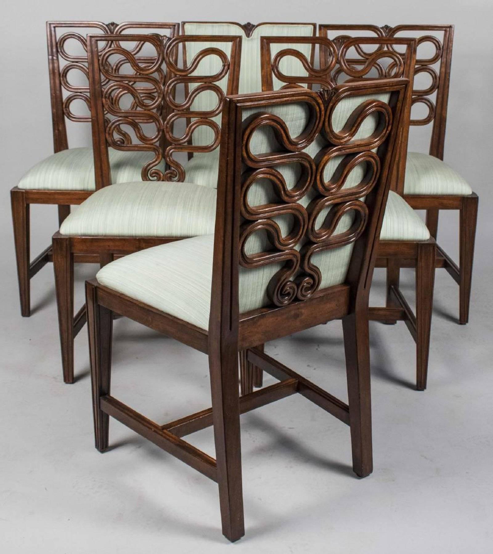 Set of six (6) dining chairs, four (4) with ribbon back splats, upholstered trapezoid seats and tapered legs, two (2) with upholstered backs. Hollywood Regency meets exotic Asian flare.  Measure: Height 37 inches, width 20 inches, depth 21 inches.