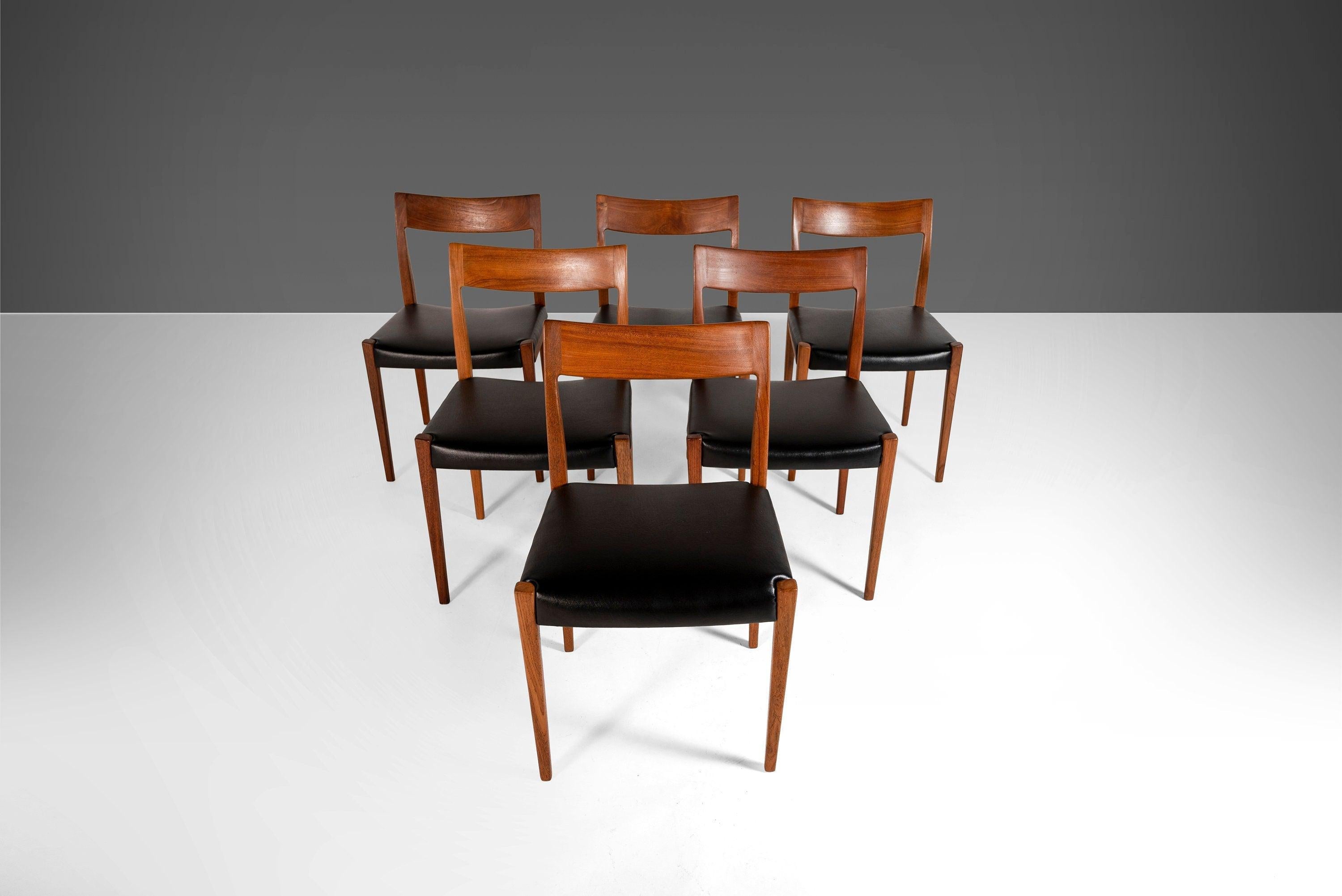 Constructed from teak with lines reminiscent of the Model 57 and Model 77 chairs designed by Neils Moller. The Kontiki side chair proved to be one of Ekstrom's most beloved designs not only for Troeds but throughout the design community. This set is