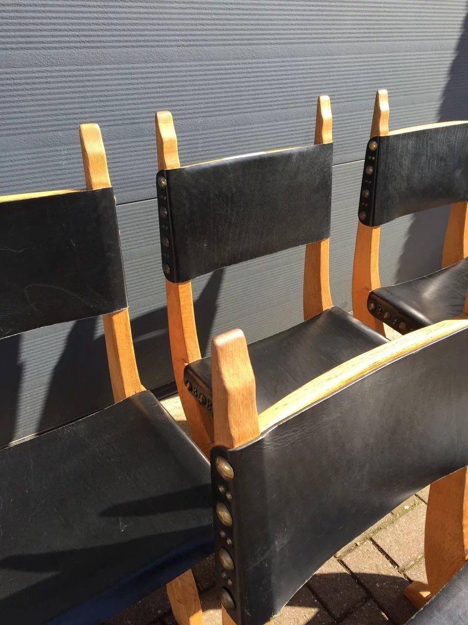 Blackened Set of Six Midcentury Era Handcrafted Solid Oak and Black Leather Chairs For Sale