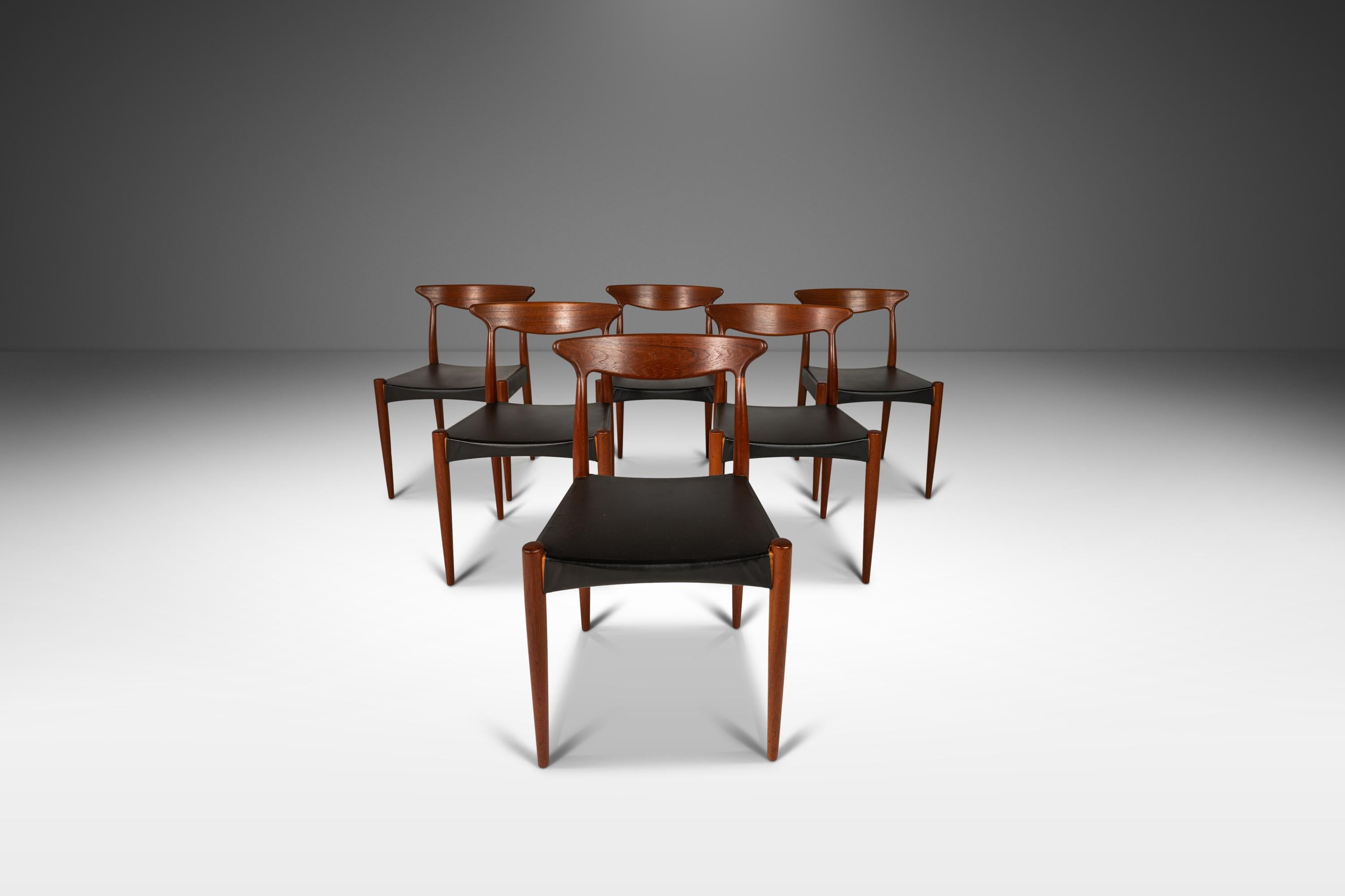 Introducing a stunning set of six Model Mk 310 Dining Chairs by the renowned Danish designer Arne Hovmand-Olsen. These chairs were crafted in the 1960s by the reputable furniture manufacturer, Mogens Kold, and feature a sleek and timeless design